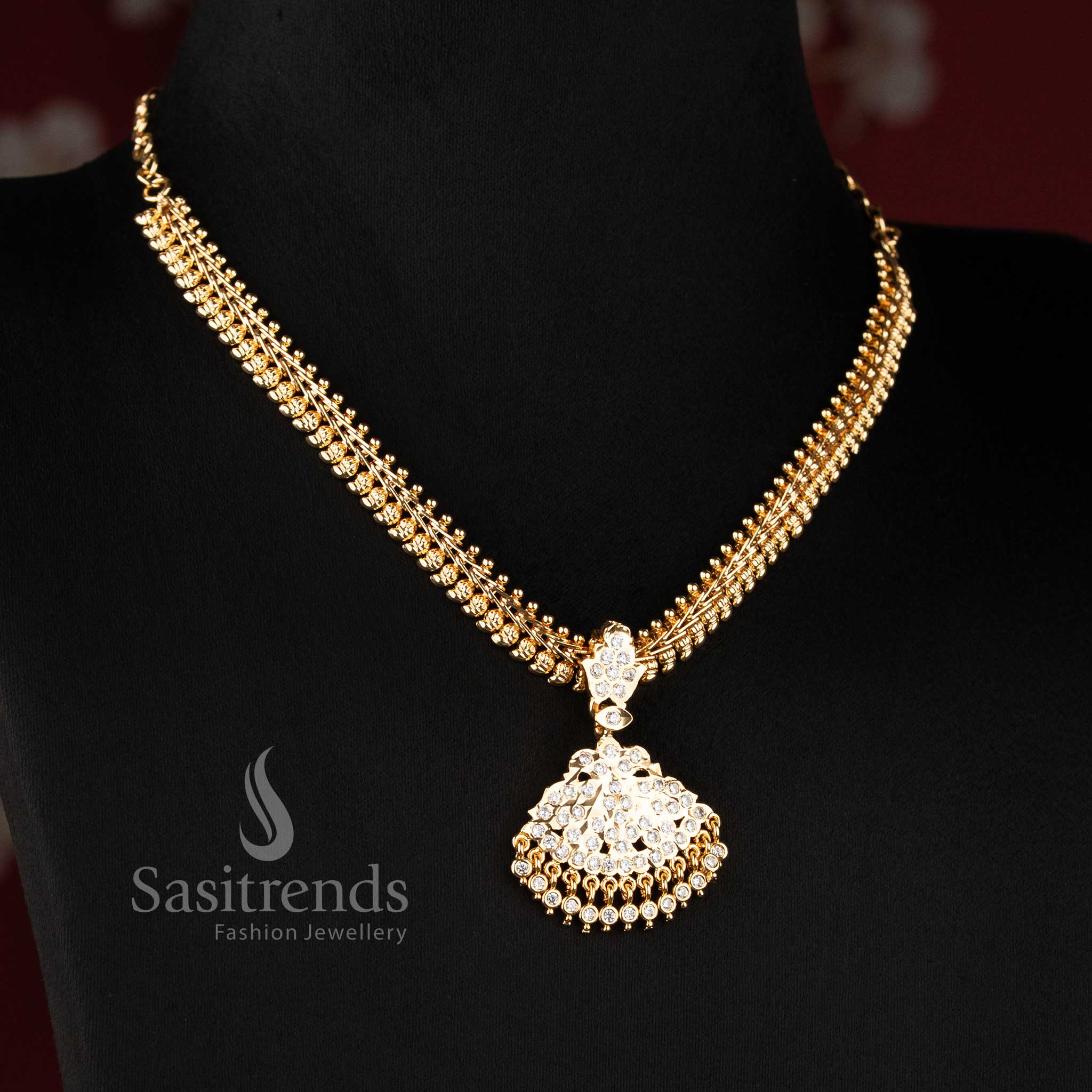 Traditional Impon micro gold plated mango pattern addigai necklace with flared leaf AD pendant in white stone design - Sasitrends