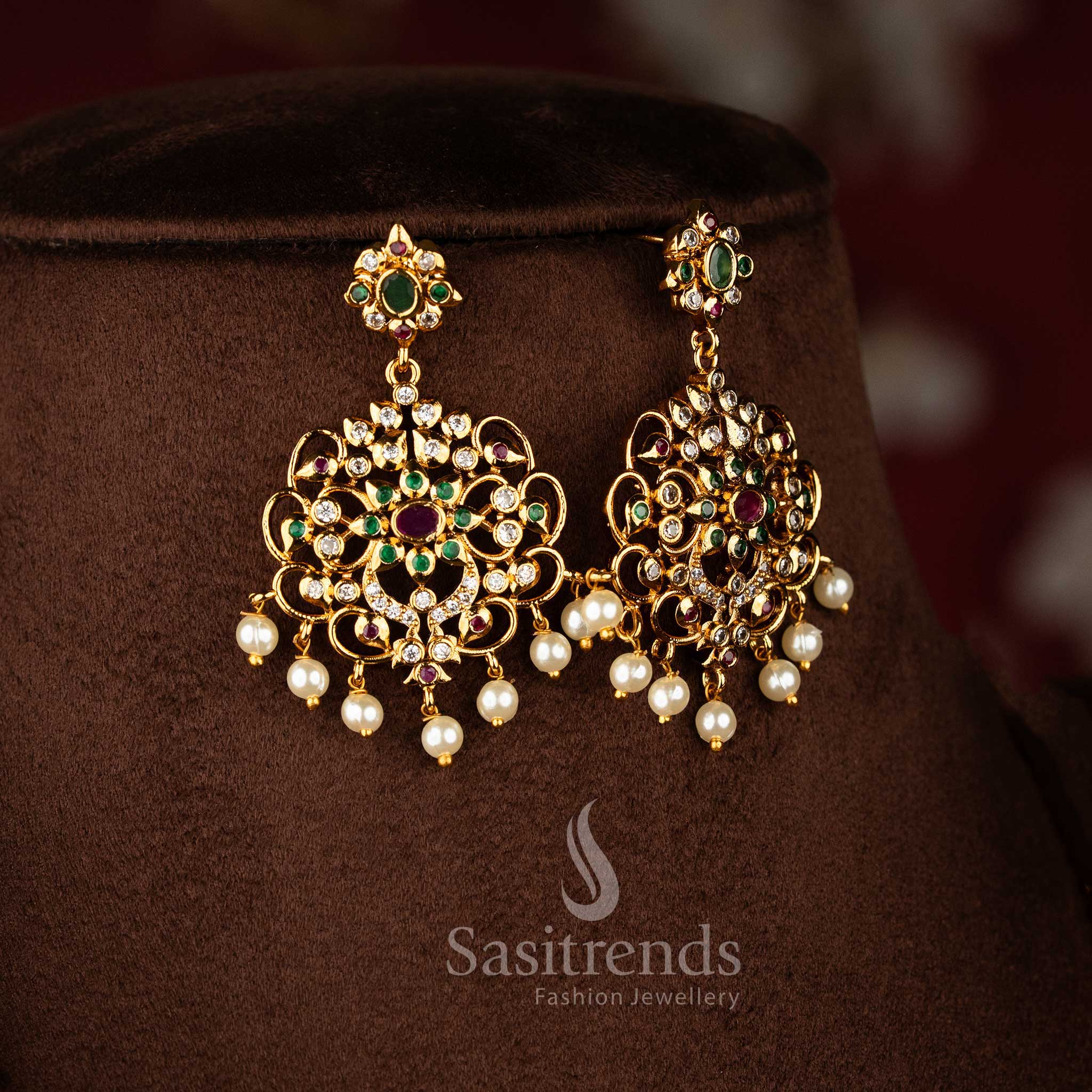 Sasitrends temple matte gold plated multi AD stone three layer long haram necklace jewellery set with peacock and floral pendant motifs 