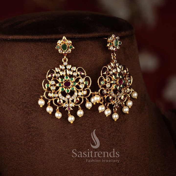 Sasitrends temple matte gold plated multi AD stone three layer long haram necklace jewellery set with peacock and floral pendant motifs 