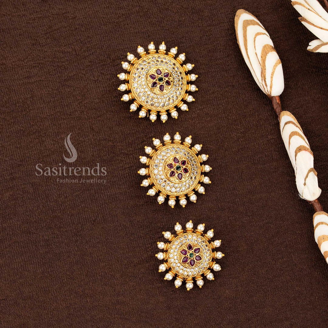Sasitrends temple matte gold plated floral medallion jadai billai with layered circular multi AD stone structure and pearl drop border