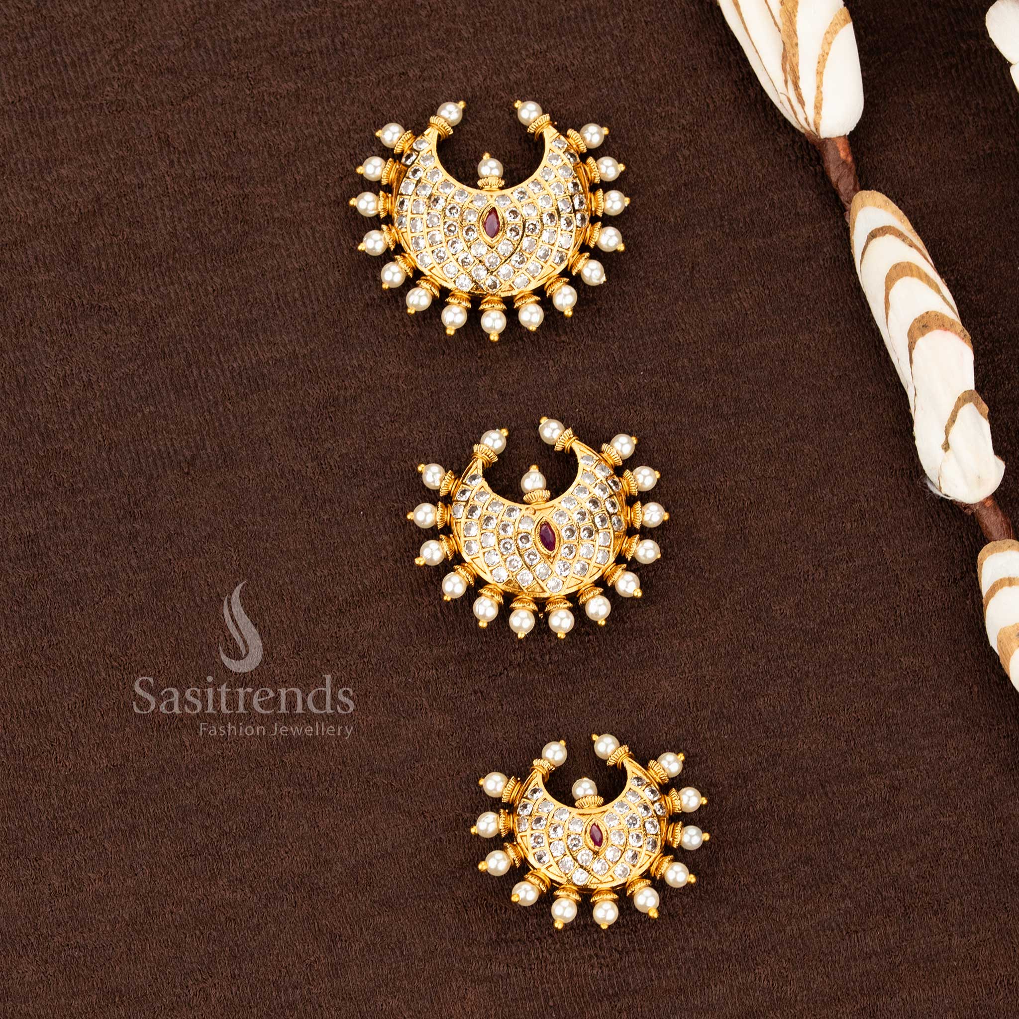 Sasitrends temple matte gold plated crescent jadai billai with dense AD stone lattice and pearl drop fringe
