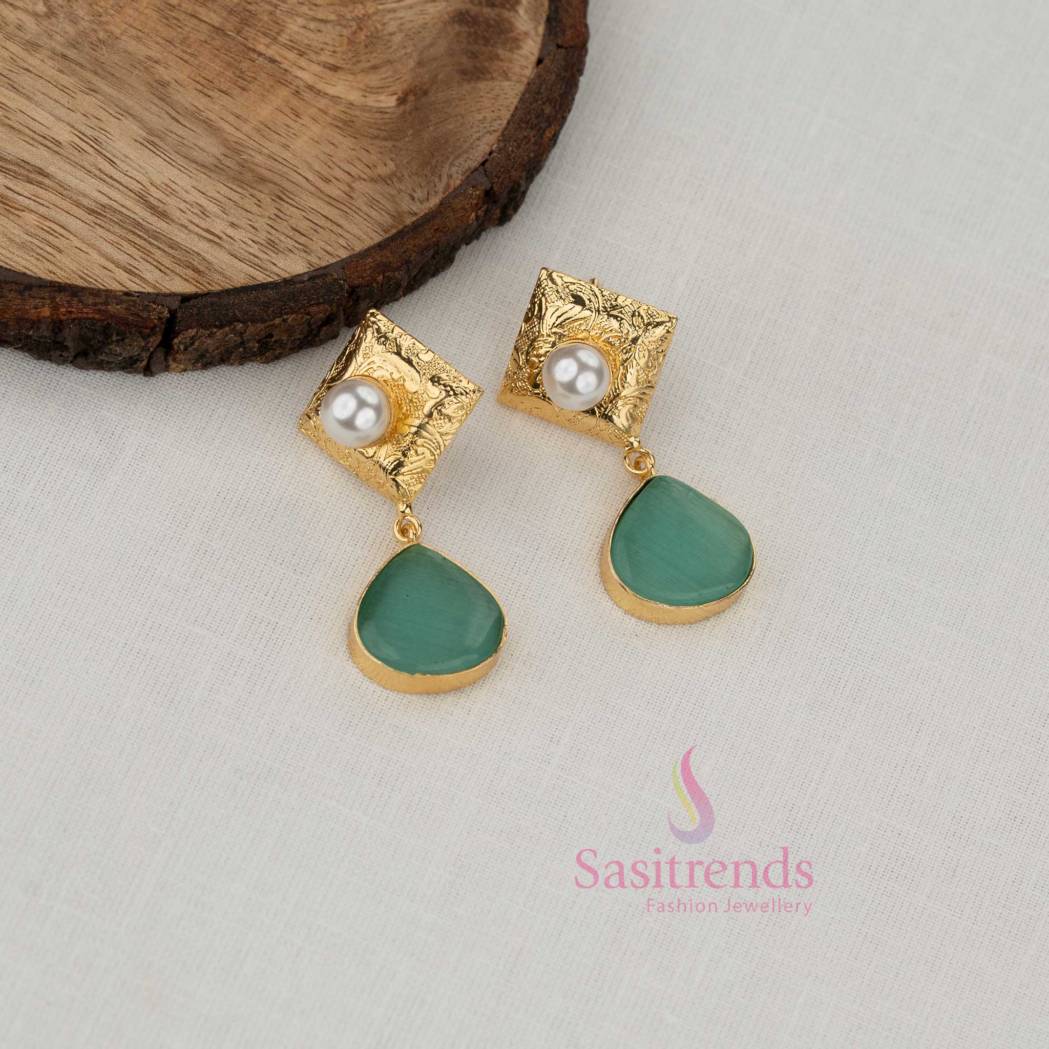 Gold plated party wear mint earrings for girls by Sasitrends with geometric square top, detailed surface texture and elegant hanging drop structure