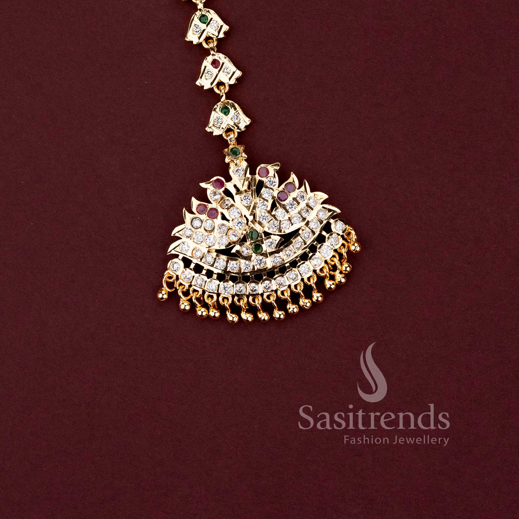 Stylish micro gold plated wedding jewellery maang tikka with brilliant Multi American Diamond stones.