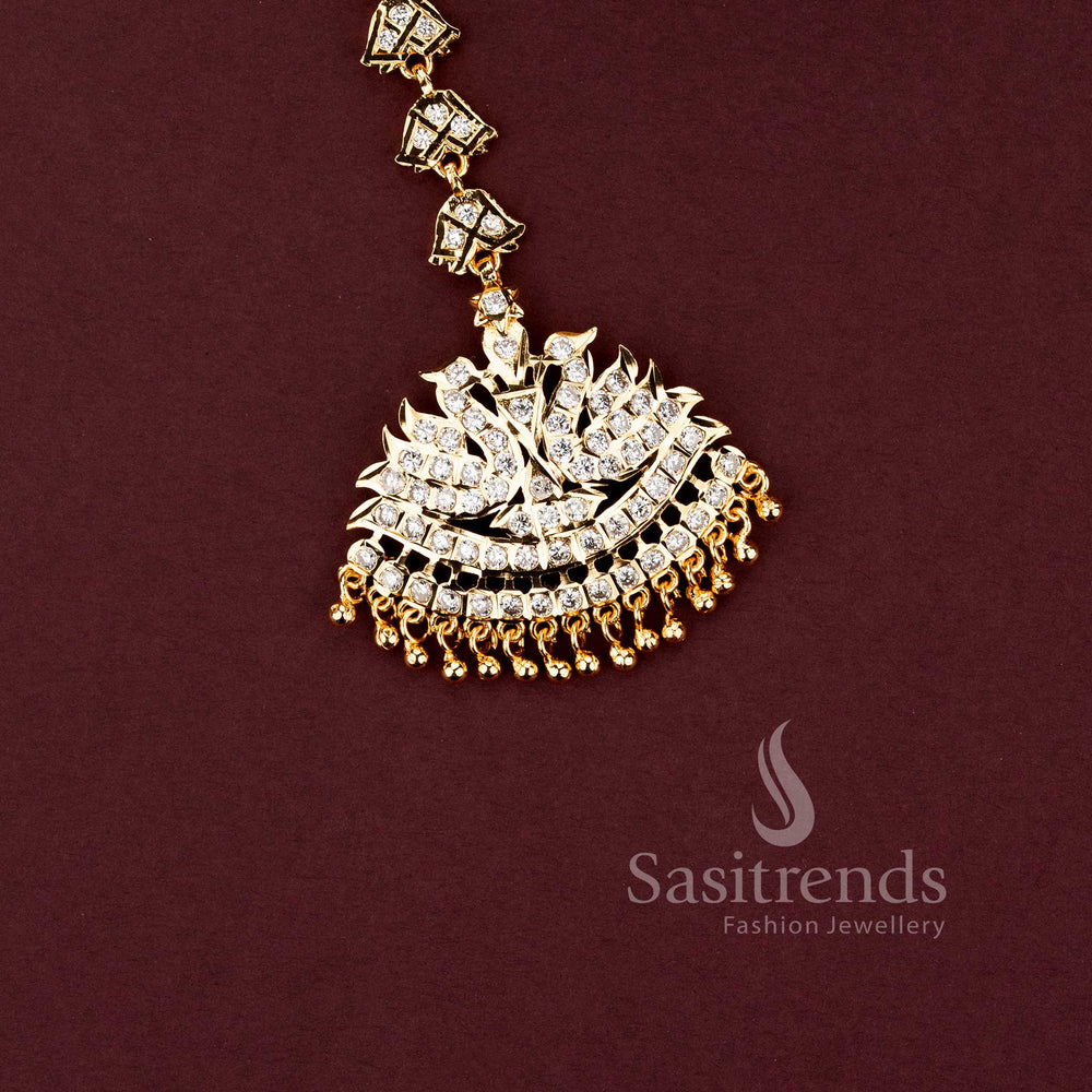 Guaranteed 24 carat look gold plated traditional bridal forehead ornament ensemble for grand silk sarees.