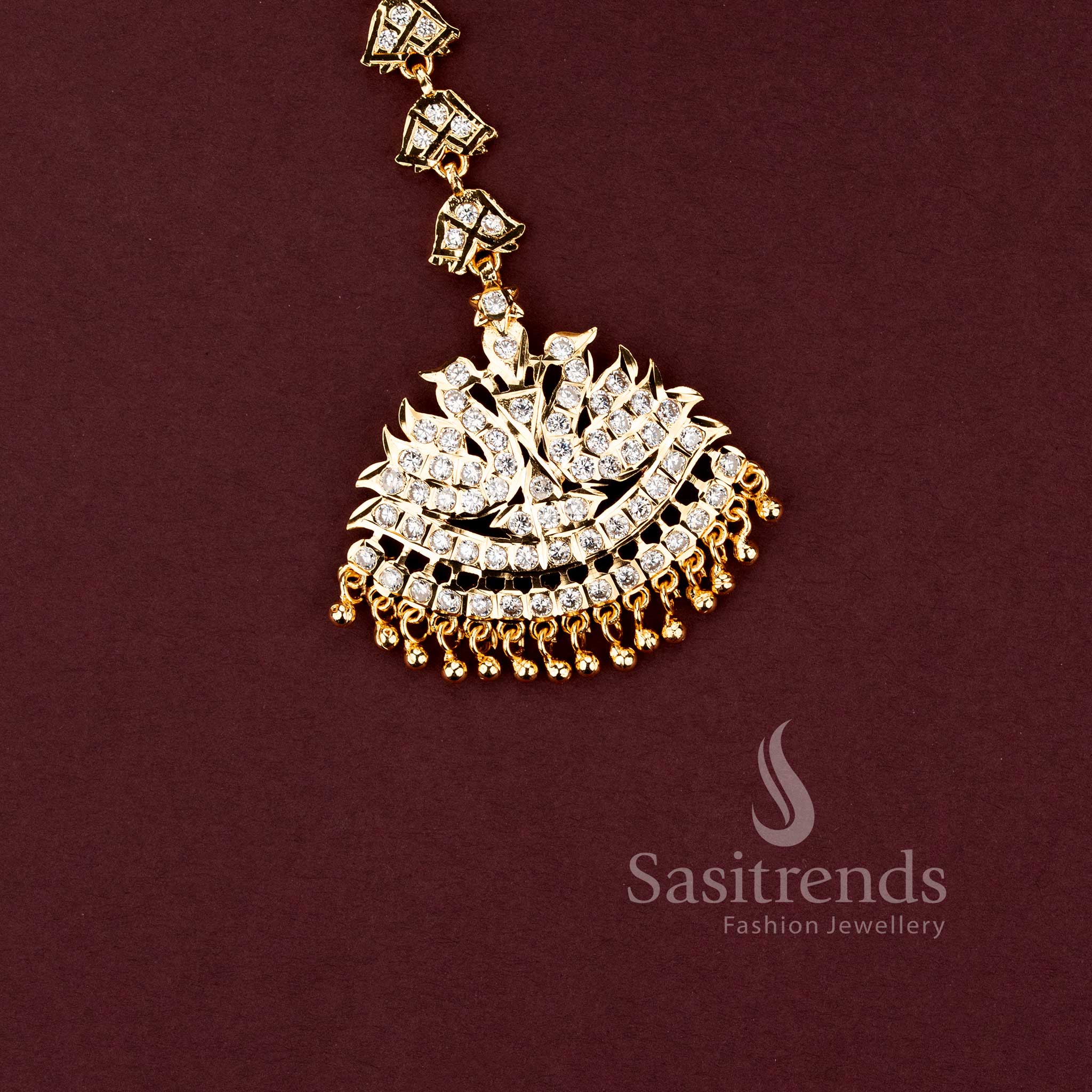 Guaranteed 24 carat look gold plated traditional bridal forehead ornament ensemble for grand silk sarees.