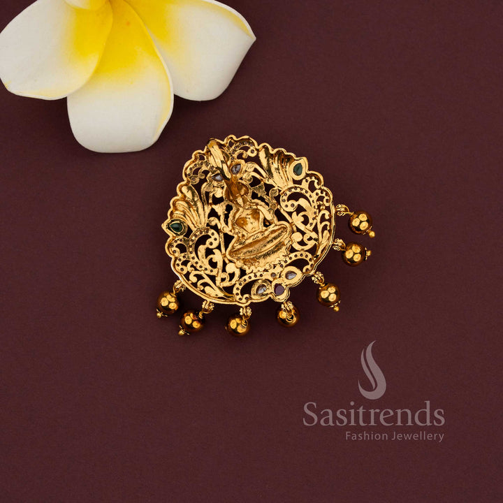 Temple Lakshmi floral matte gold pendant with traditional detailing and bead drops
