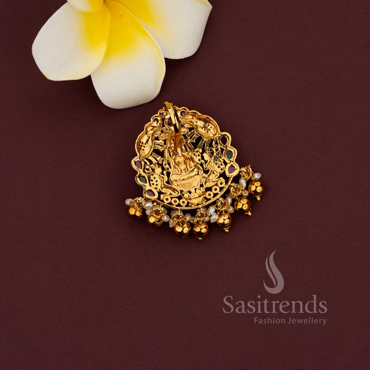Matte gold temple pendant featuring elegant floral peacock pattern