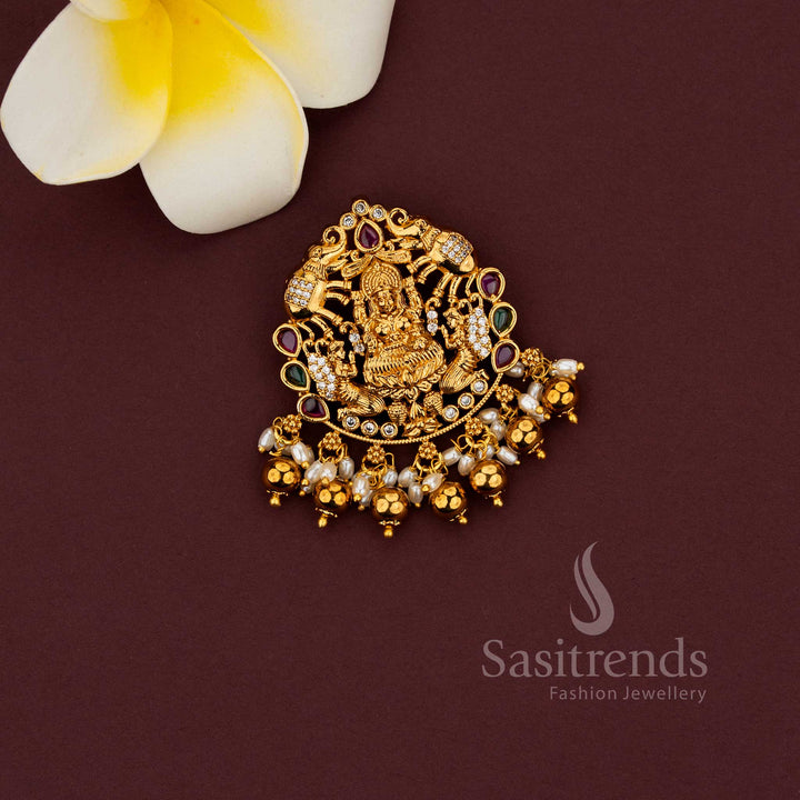 Matte gold temple pendant featuring elegant floral peacock pattern