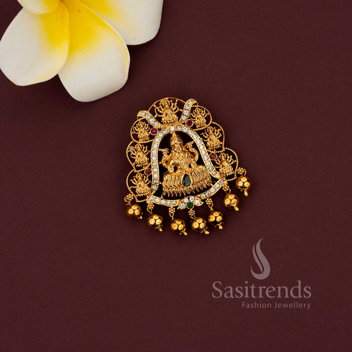 Temple jewellery pendant featuring Gaja Lakshmi motif and intricate detailing 