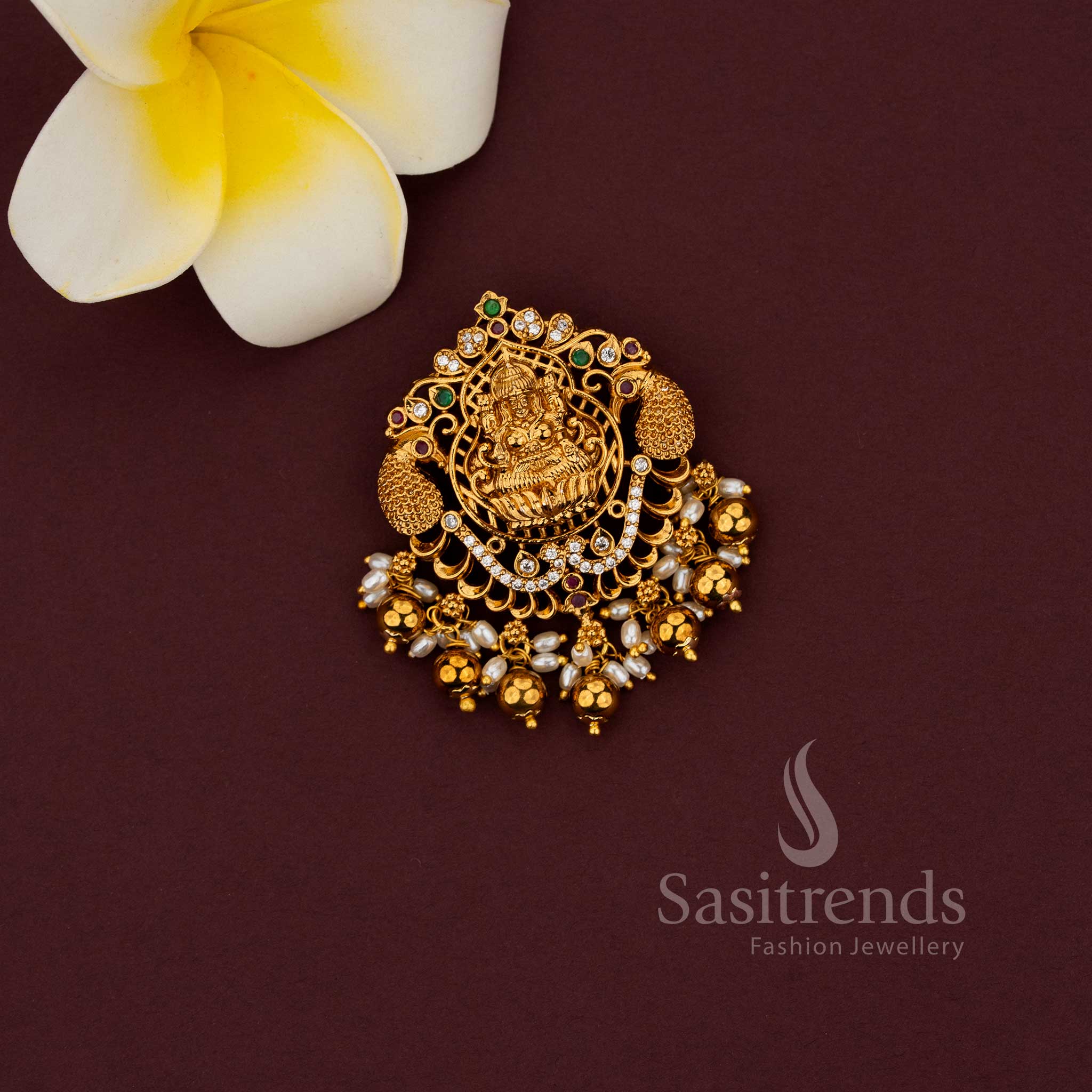 Matte gold temple pendant featuring Lakshmi and peacock combination design 