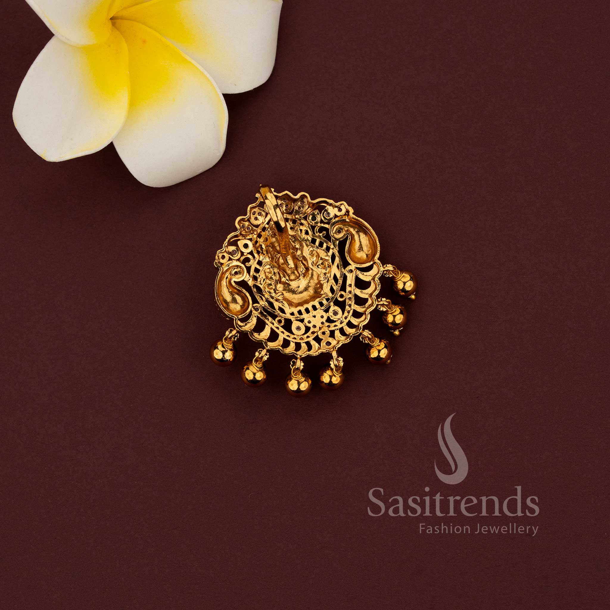 Matte gold temple pendant featuring Lakshmi and peacock combination design 