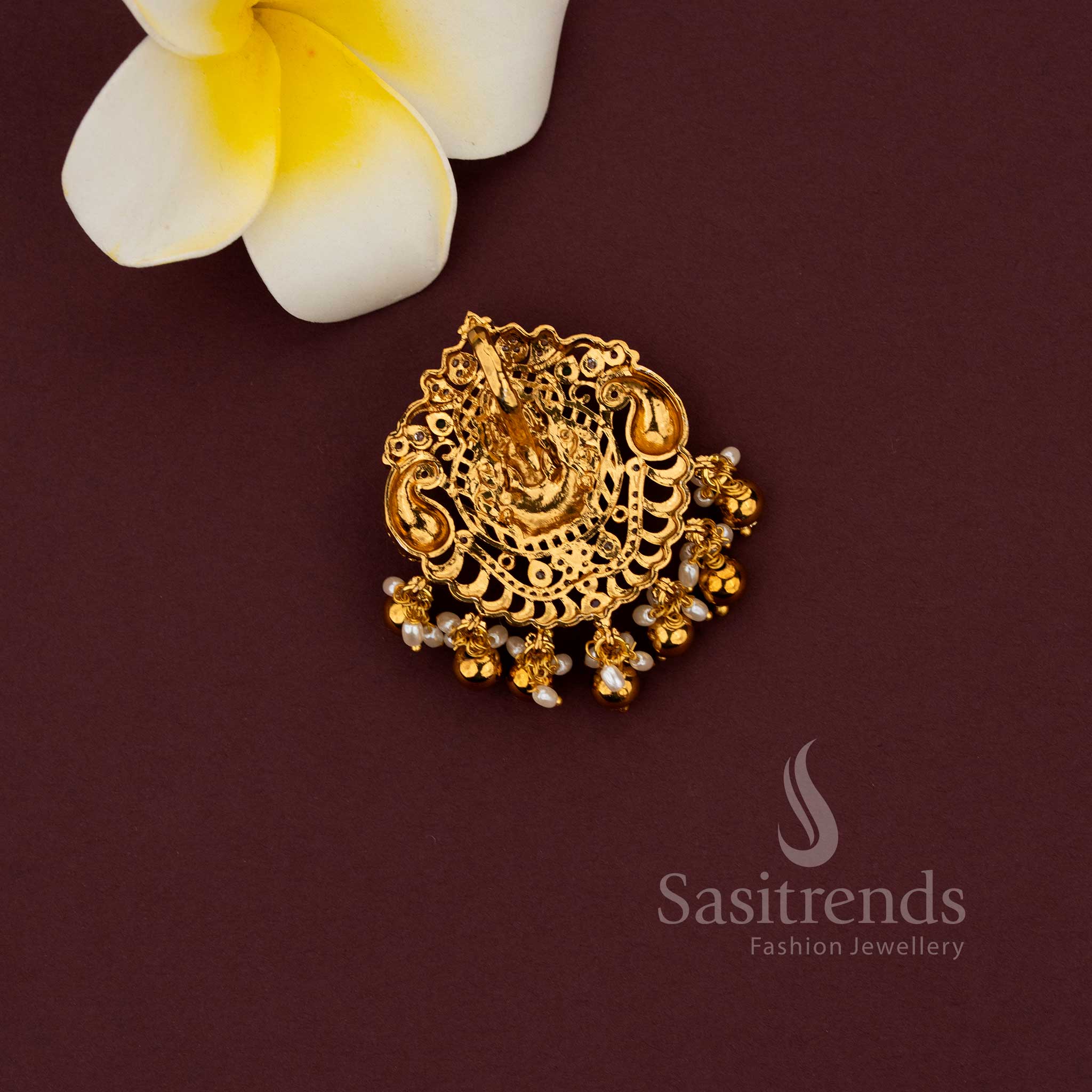 Matte gold temple pendant featuring Lakshmi and peacock combination design 