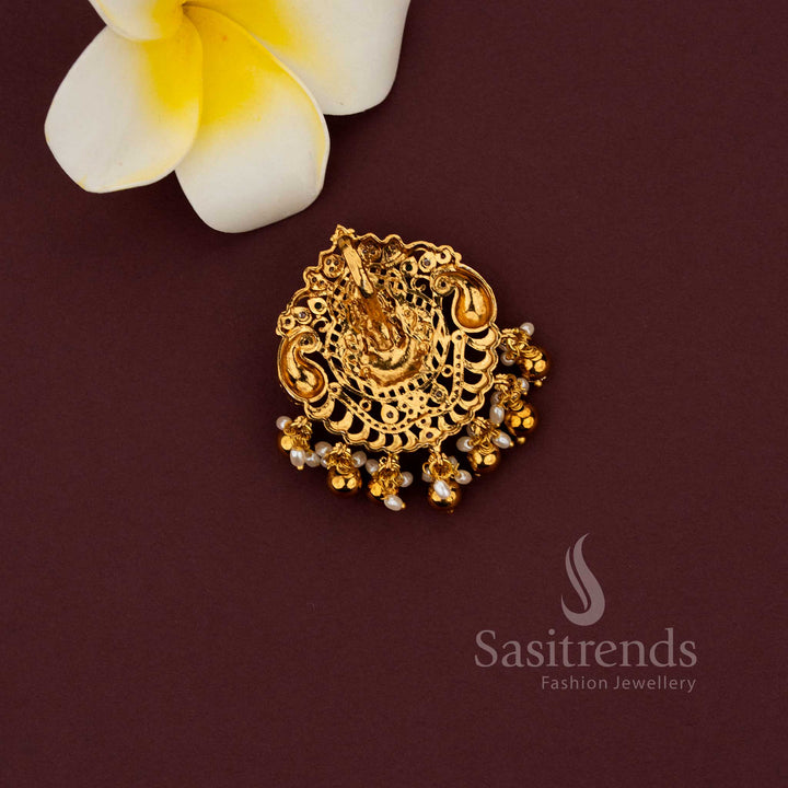 Matte gold temple pendant featuring Lakshmi and peacock combination design 