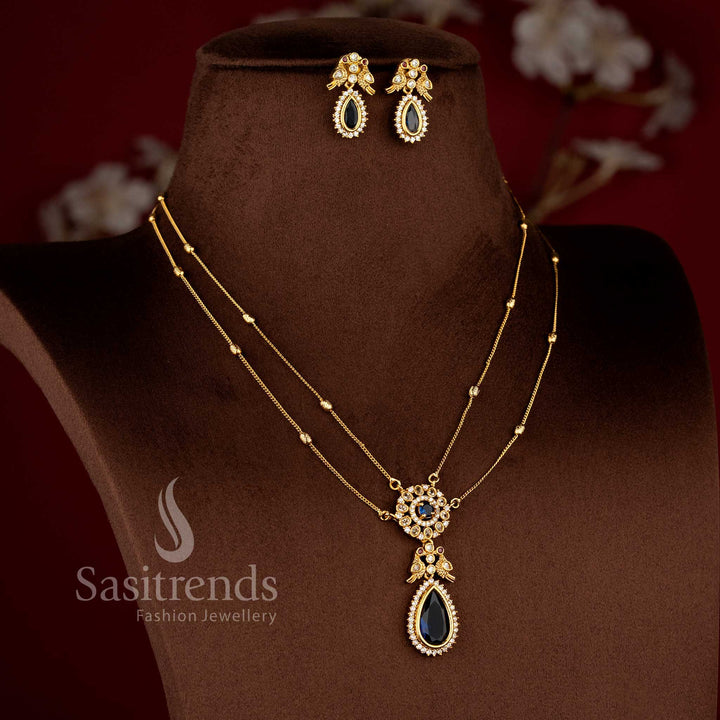 Traditional Two Line Chain Necklace Jewellery Set with American Diamond Stones, blue Center Detailing and Matte Gold Finish - Sasitrends 
