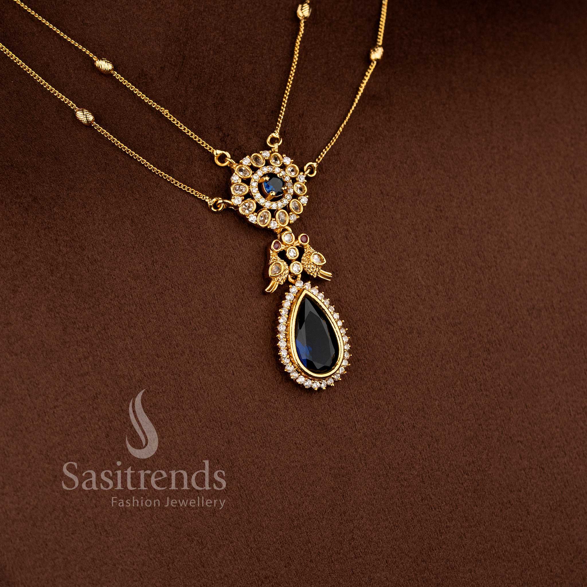 Traditional Two Line Chain Necklace Jewellery Set with American Diamond Stones, blue Center Detailing and Matte Gold Finish - Sasitrends 