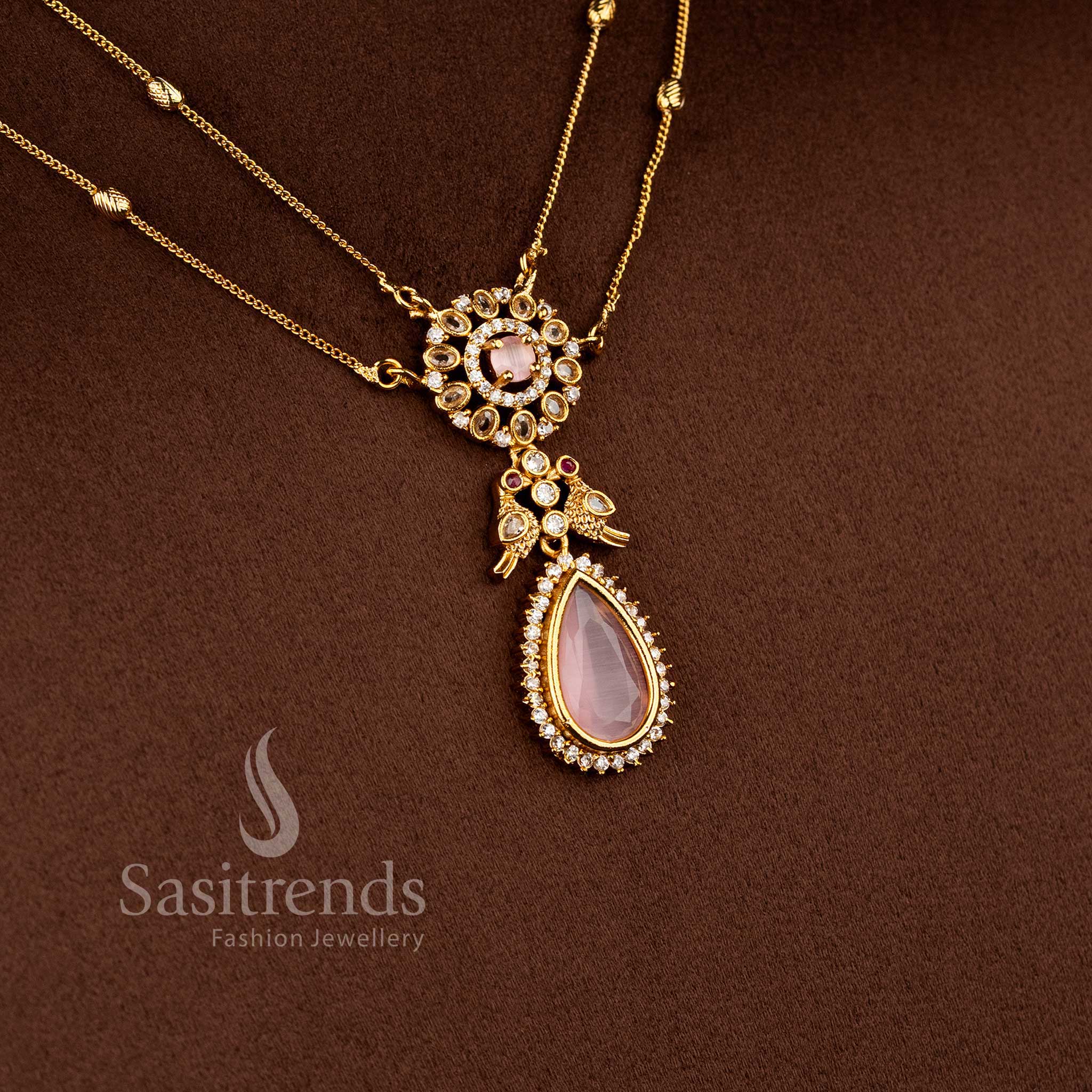 Traditional Two Line Chain Necklace Jewellery Set with American Diamond Stones, Pink Center Detailing and Matte Gold Finish - Sasitrends
