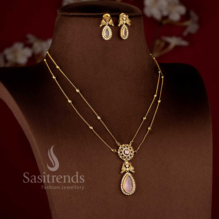Traditional Two Line Chain Necklace Jewellery Set with American Diamond Stones, Pink Center Detailing and Matte Gold Finish - Sasitrends