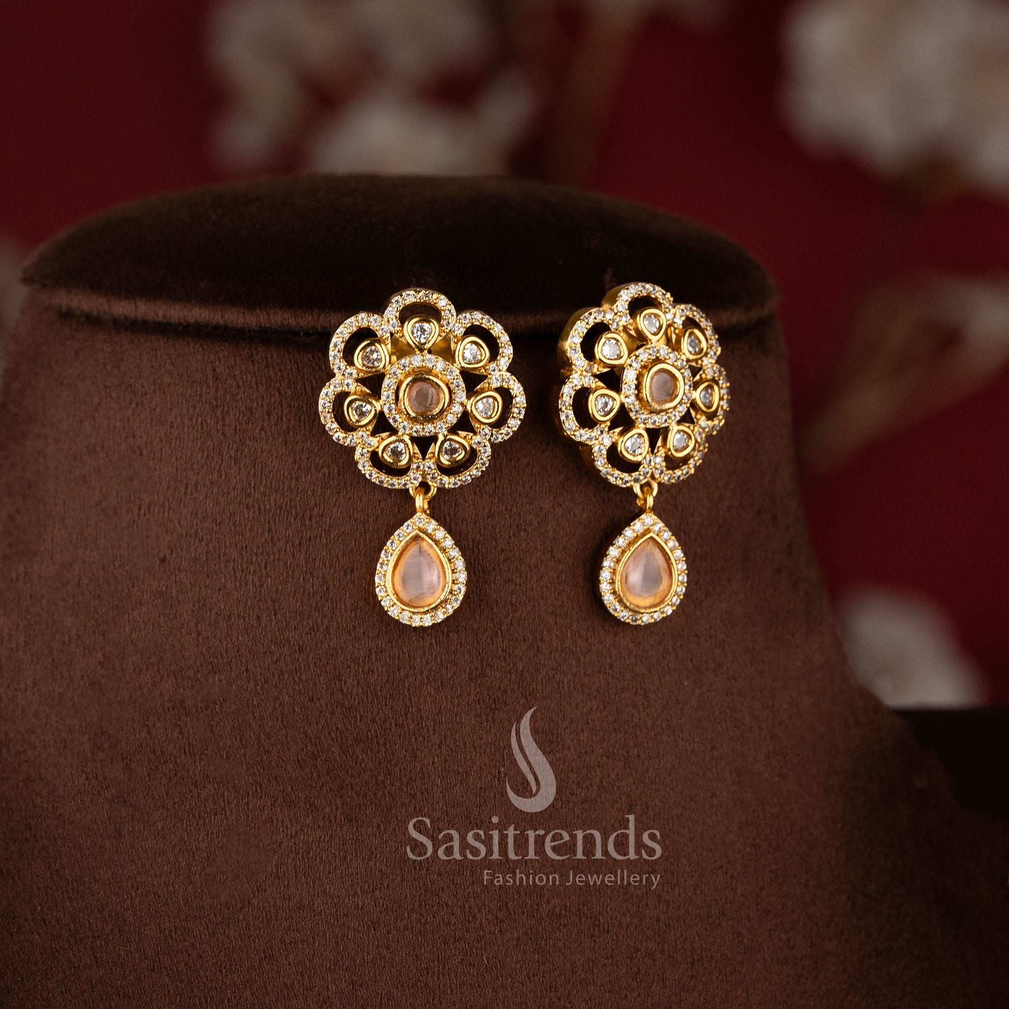 Elegant Two Line Floral Necklace Set with Ruby center stones, sparkling AD stones, and traditional matte gold styling - Sasitrends