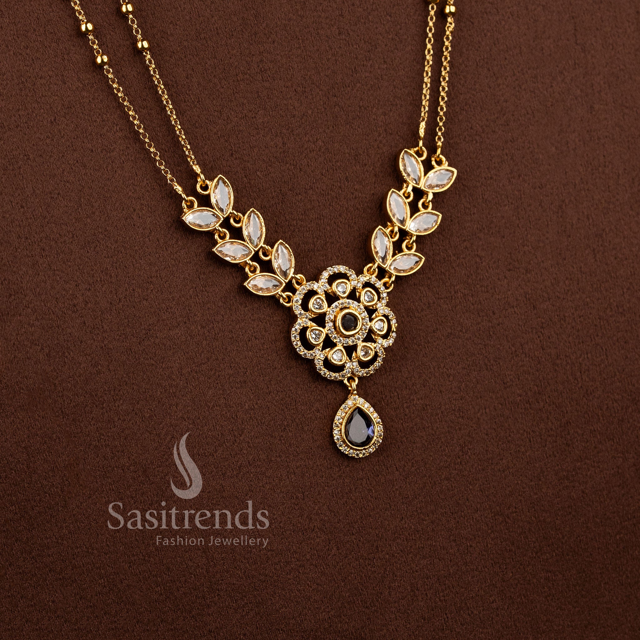 Exquisite American Diamond Matte Gold Two Line Floral Necklace Set featuring Ruby stone accents and elegant dual layer traditional jewellery design - Sasitrends