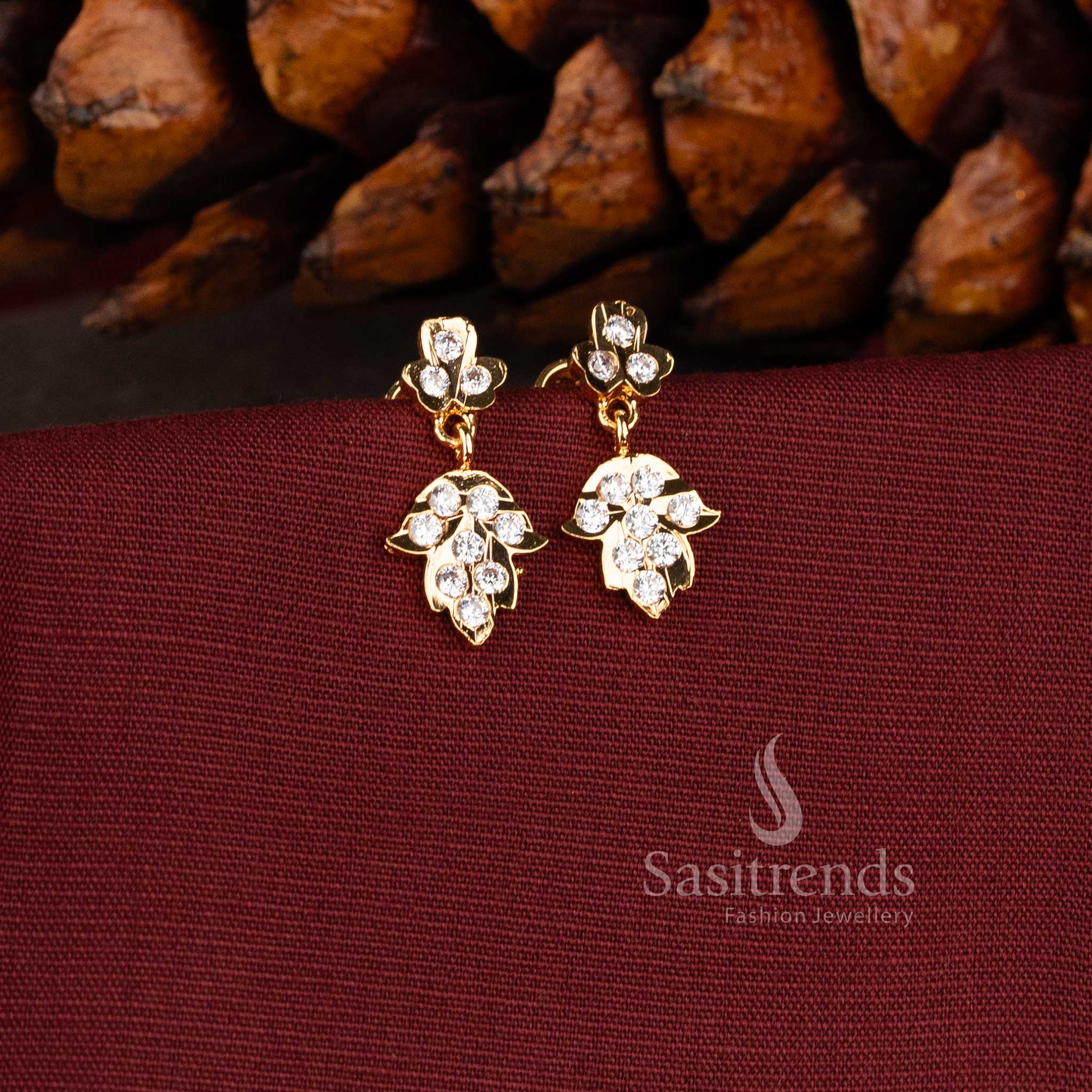 Traditional South Indian Floral leaf pendant design featuring ruby-pink centers and brilliant white stone settings 2943G - Sasitrends