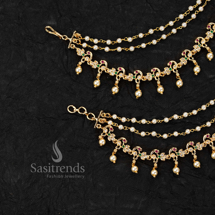 Micro gold plated ear chains featuring peacock motif with AD stones and pearl drop detailing in elegant design - Sasitrends