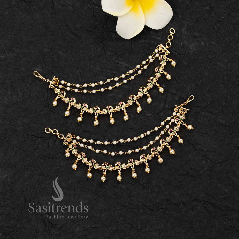 Micro gold plated ear chains featuring peacock motif with AD stones and pearl drop detailing in elegant design - Sasitrends 