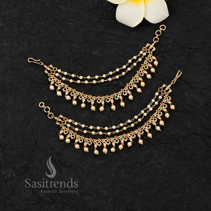Micro gold plated ear chains featuring motif with AD stones and pearl drop detailing in elegant design