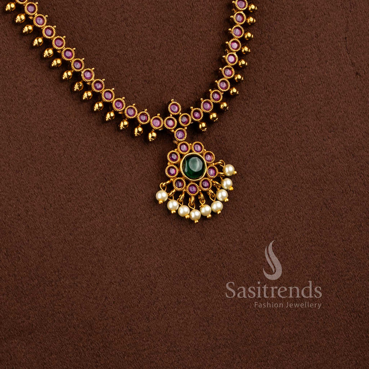 Detailed view of matte gold jewellery set featuring stone-studded floral motifs and antique finish - Sasitrends