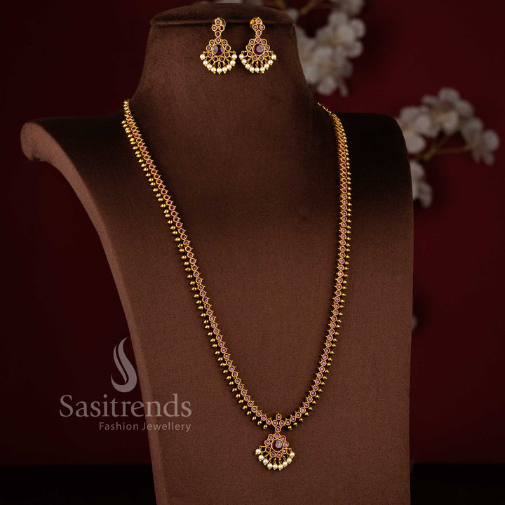 Traditional South Indian style long and long necklace set with matching crescent earrings - Sasitrends