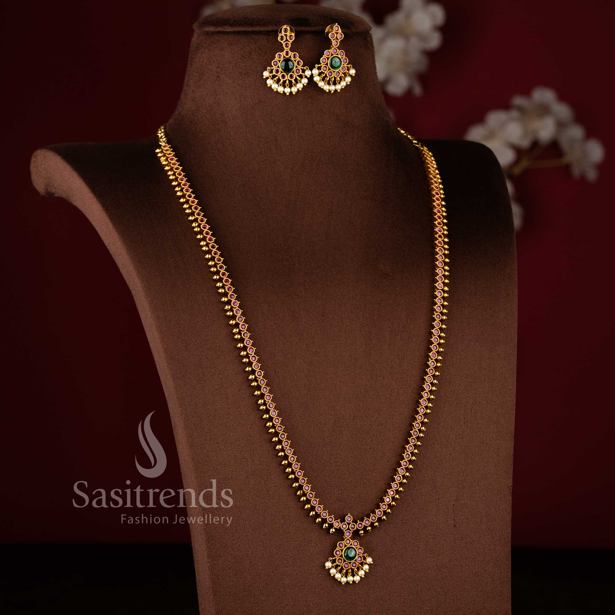 Traditional South Indian style long and long necklace set with matching crescent earrings - Sasitrends