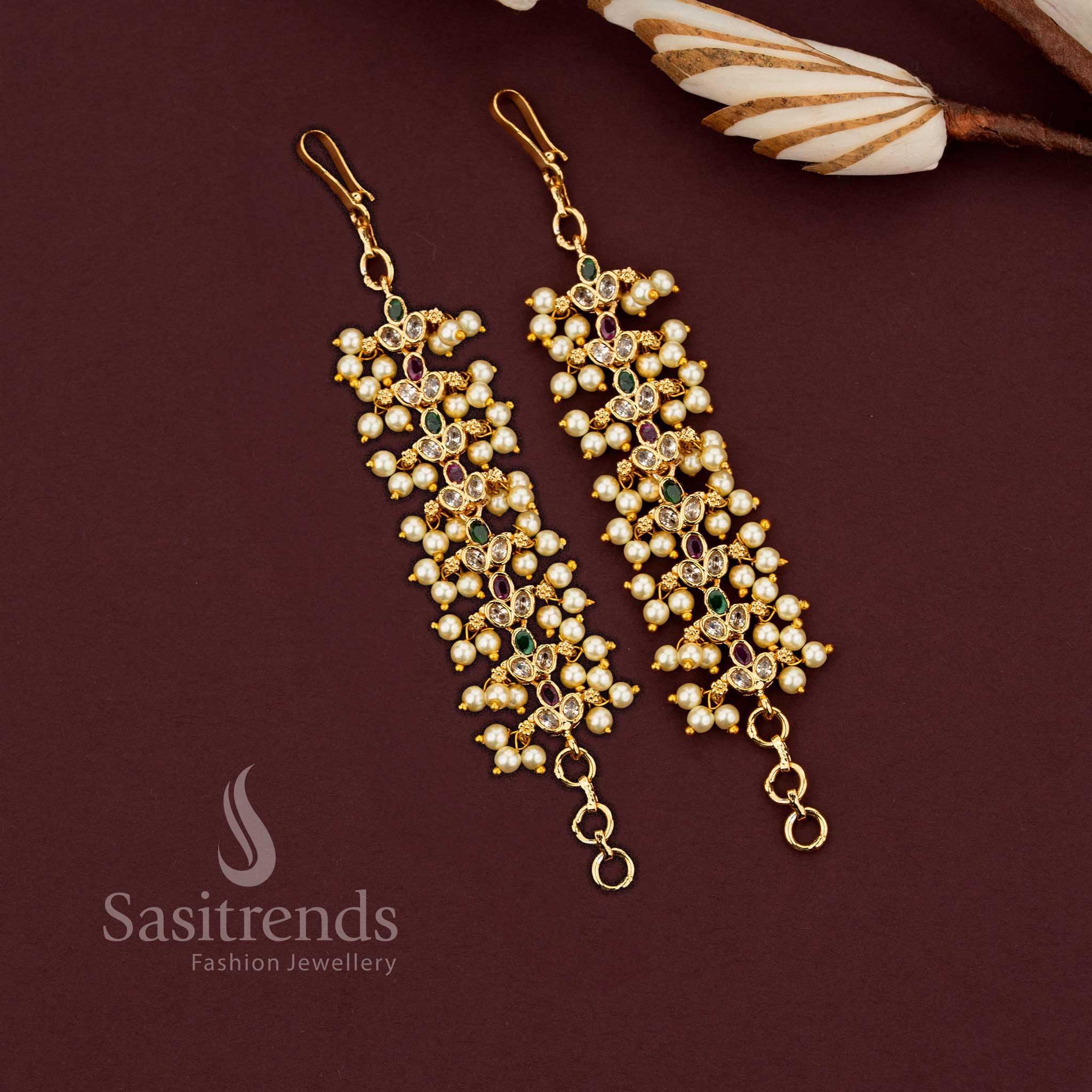 Micro gold plated multi stone matil ear chain with American diamond stones, ruby green accents and pearl clusters by Sasitrends