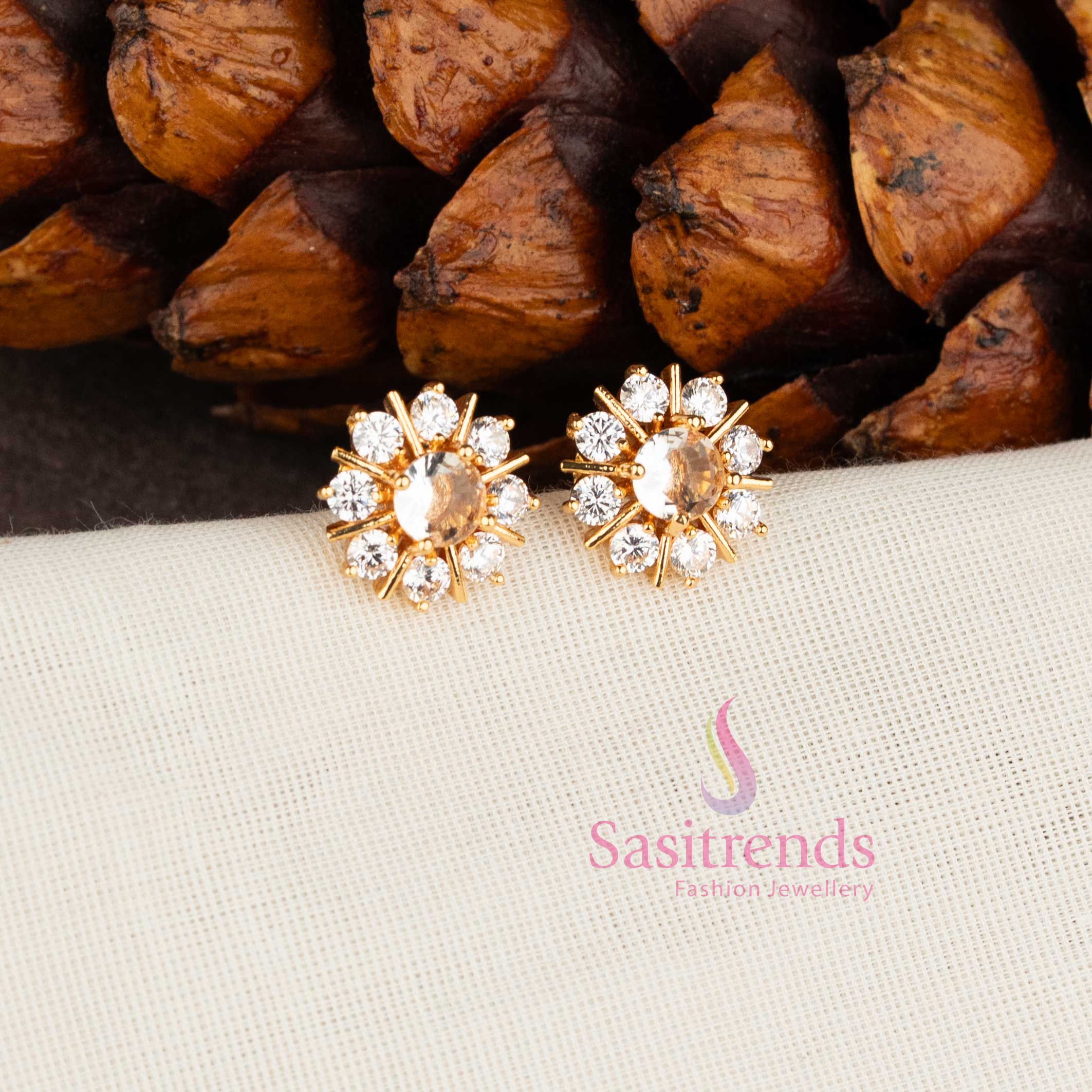 Stylish micro gold plated floral stud earrings with sparkling white AD stones - Sasitrends