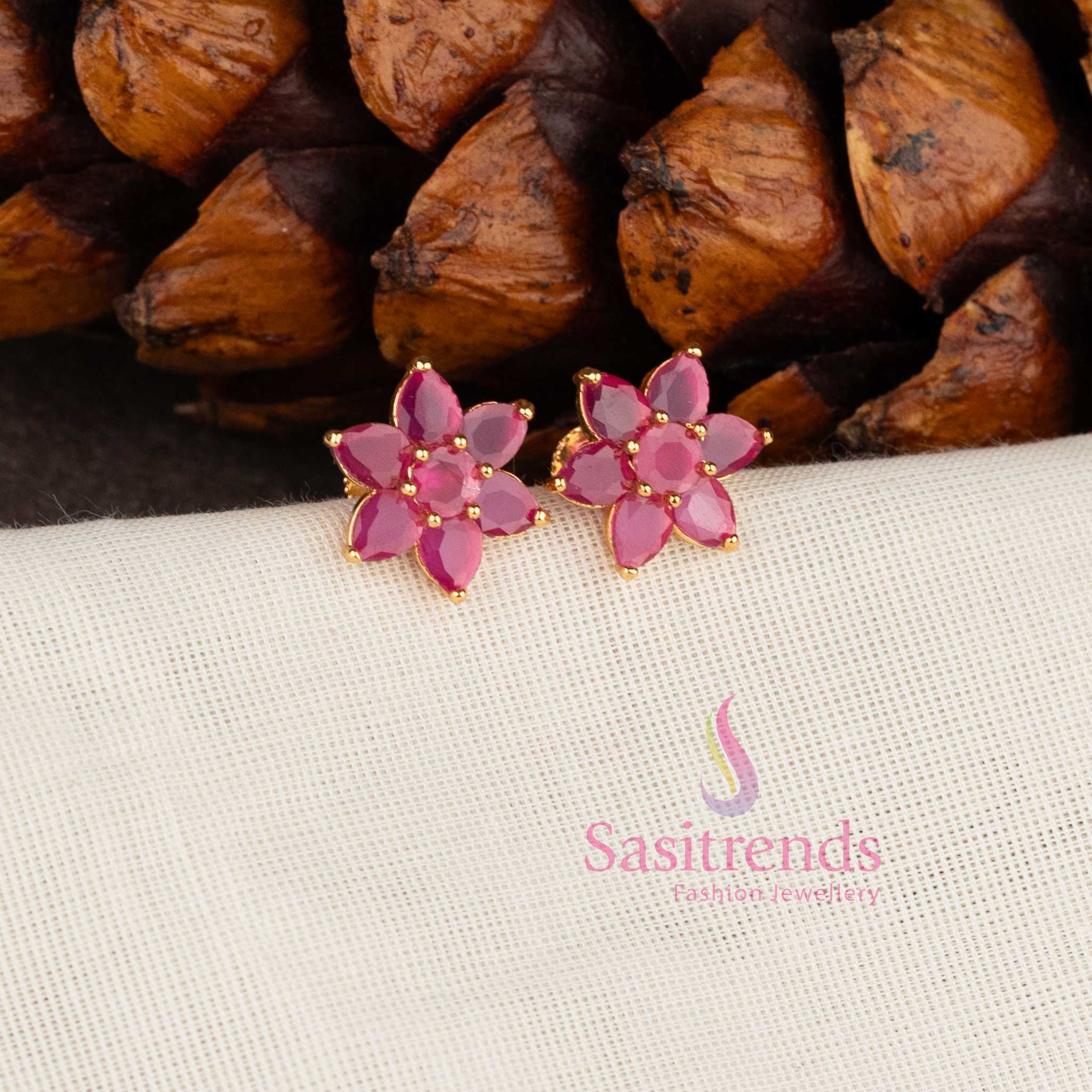 Stylish Ruby crystal floral stud earrings in micro gold plating by Sasitrends.