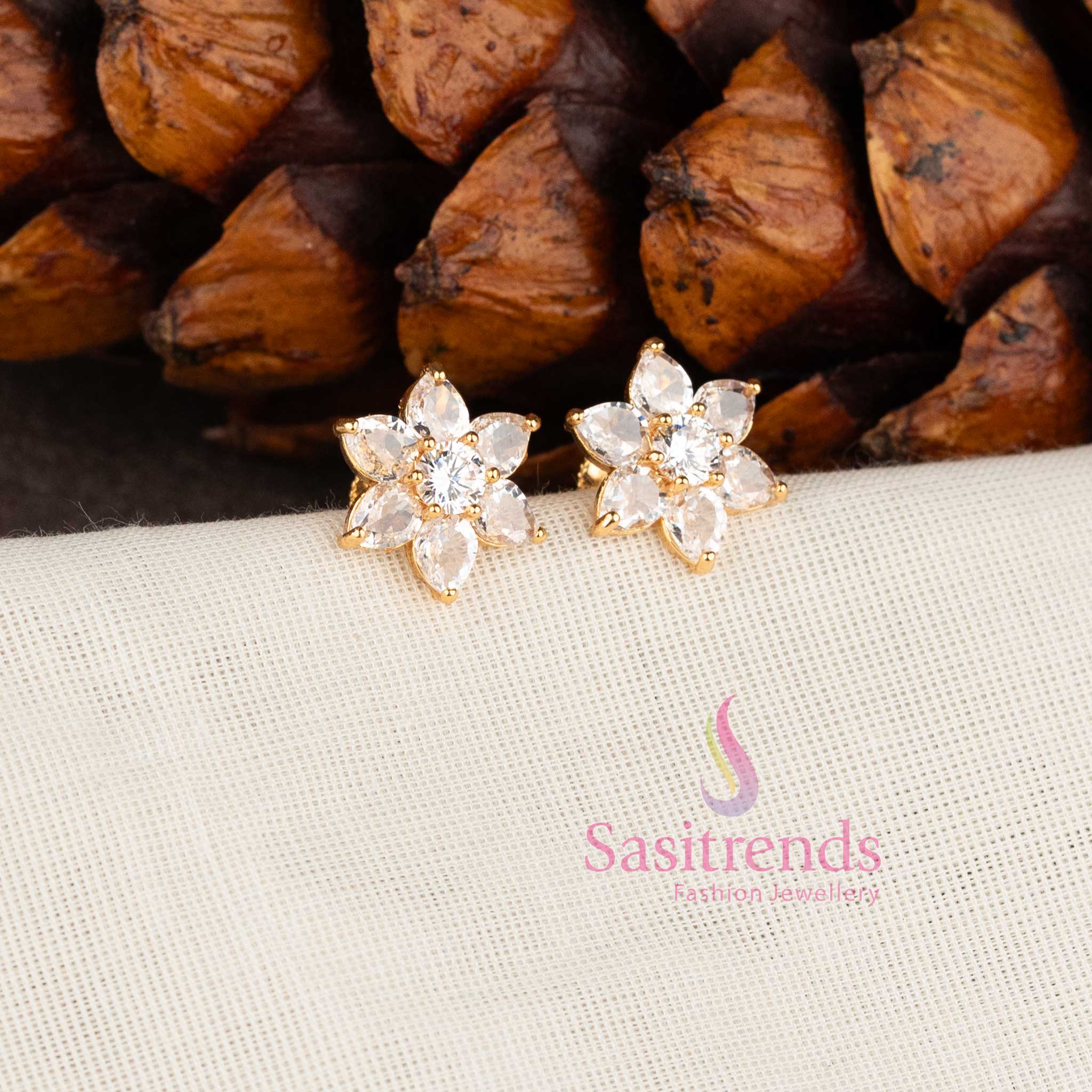 Elegant White floral stone stud earrings with micro gold finish by Sasitrends