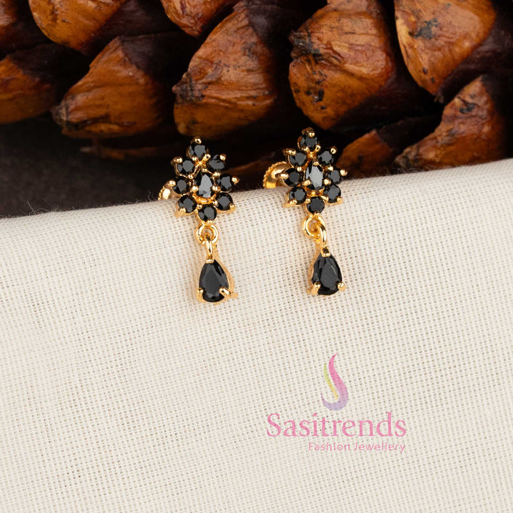 Sparkling micro gold plated American Diamond floral stud earrings with white stones by Sasitrends.