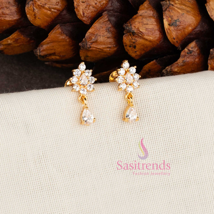 Sparkling micro gold plated American Diamond floral stud earrings with White stones by Sasitrends.