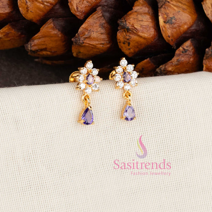 Sparkling micro gold plated American Diamond floral stud earrings with white stones by Sasitrends.