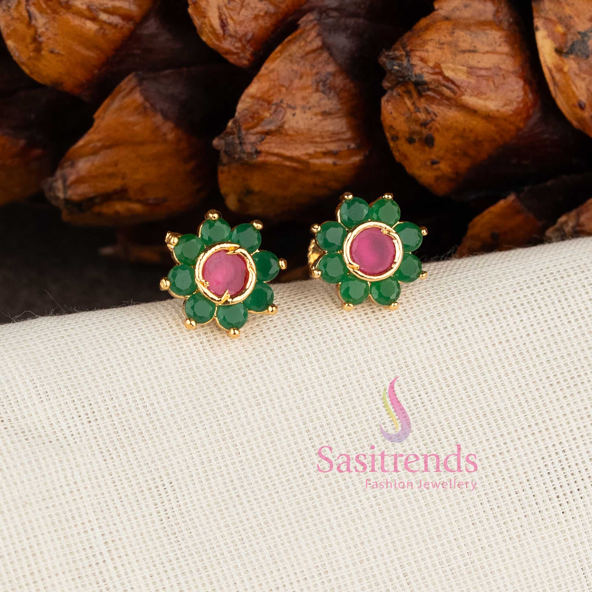 Micro gold plated floral stud earrings with green ruby stones and American diamonds by Sasitrends