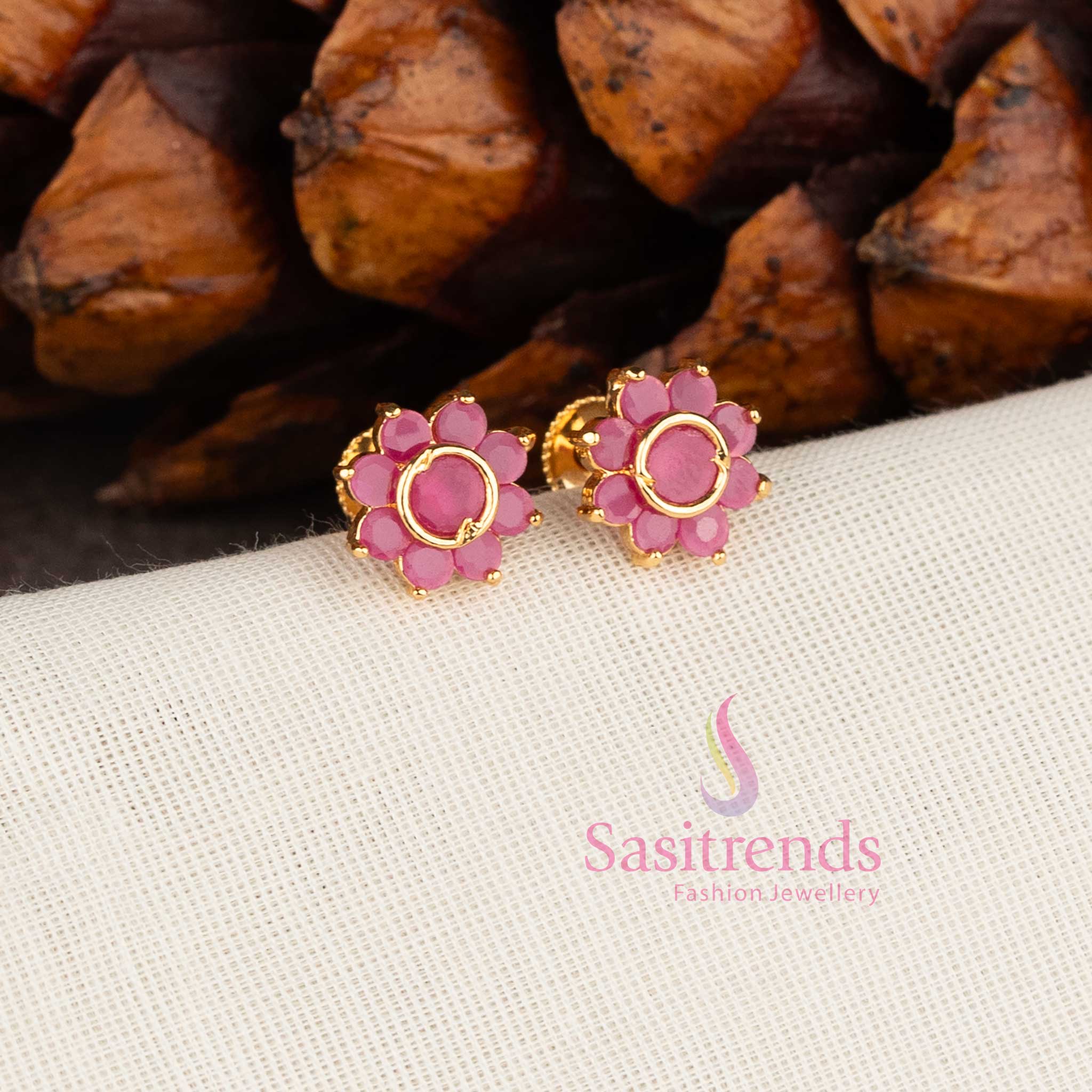 Micro gold plated floral stud earrings with ruby stones and American diamonds by Sasitrends