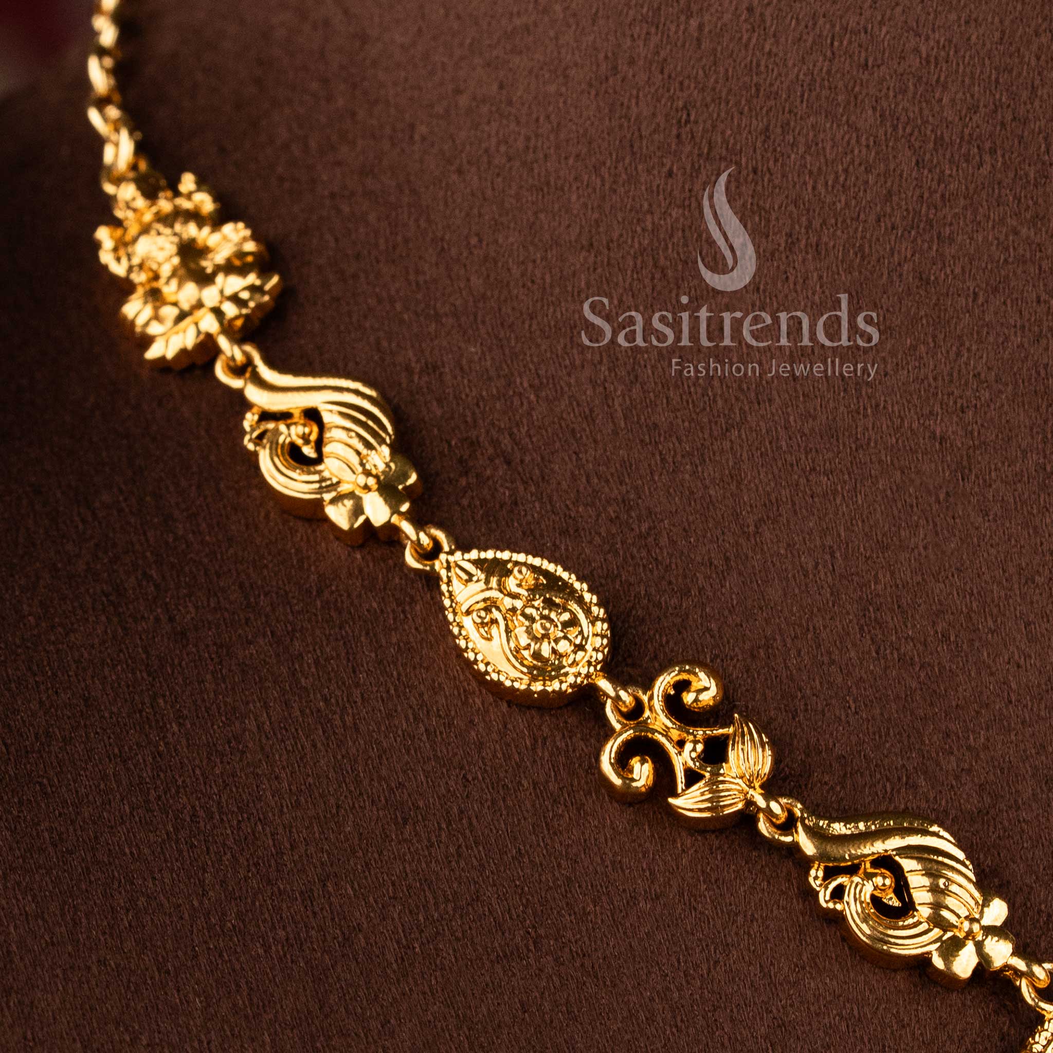 Bridal temple jewellery necklace set with meenakari detailing and matching earrings.