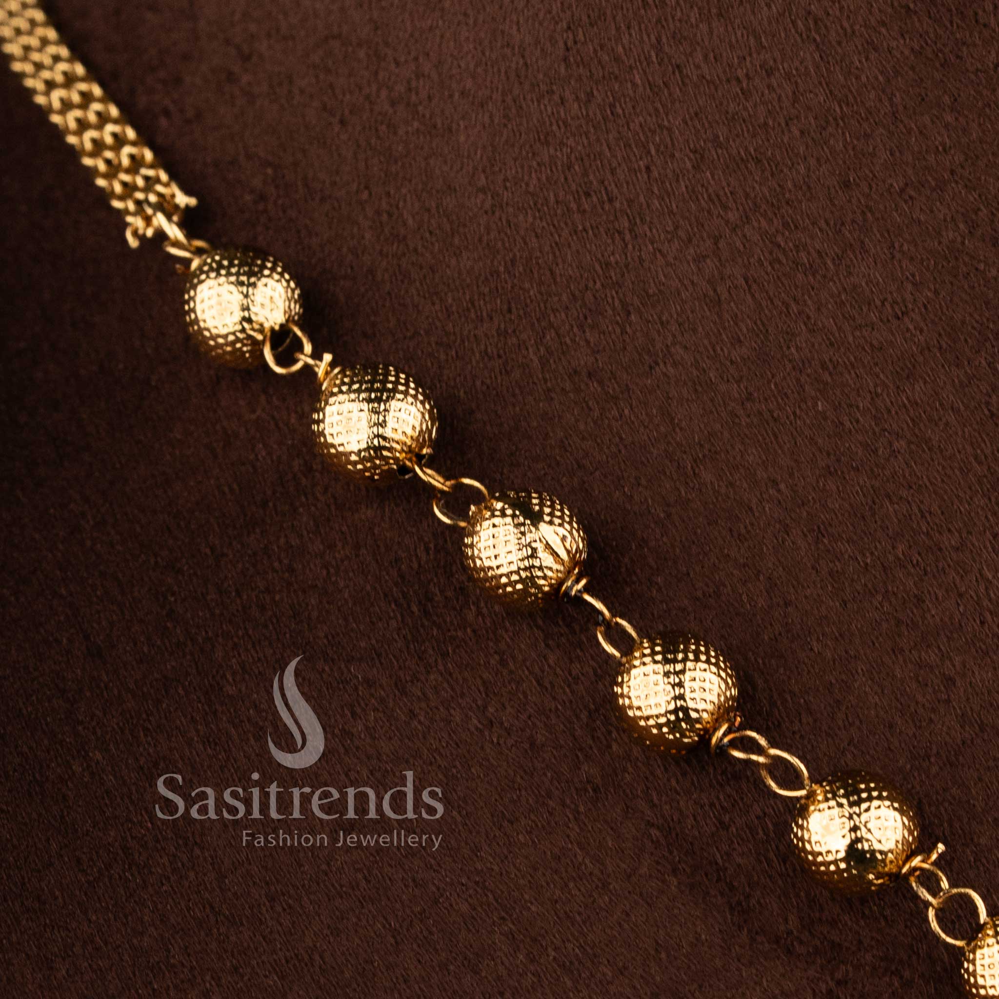 Elegant South Indian temple jewellery set featuring textured ball chain and artistic Lakshmi motif pendant - Sasitrends.