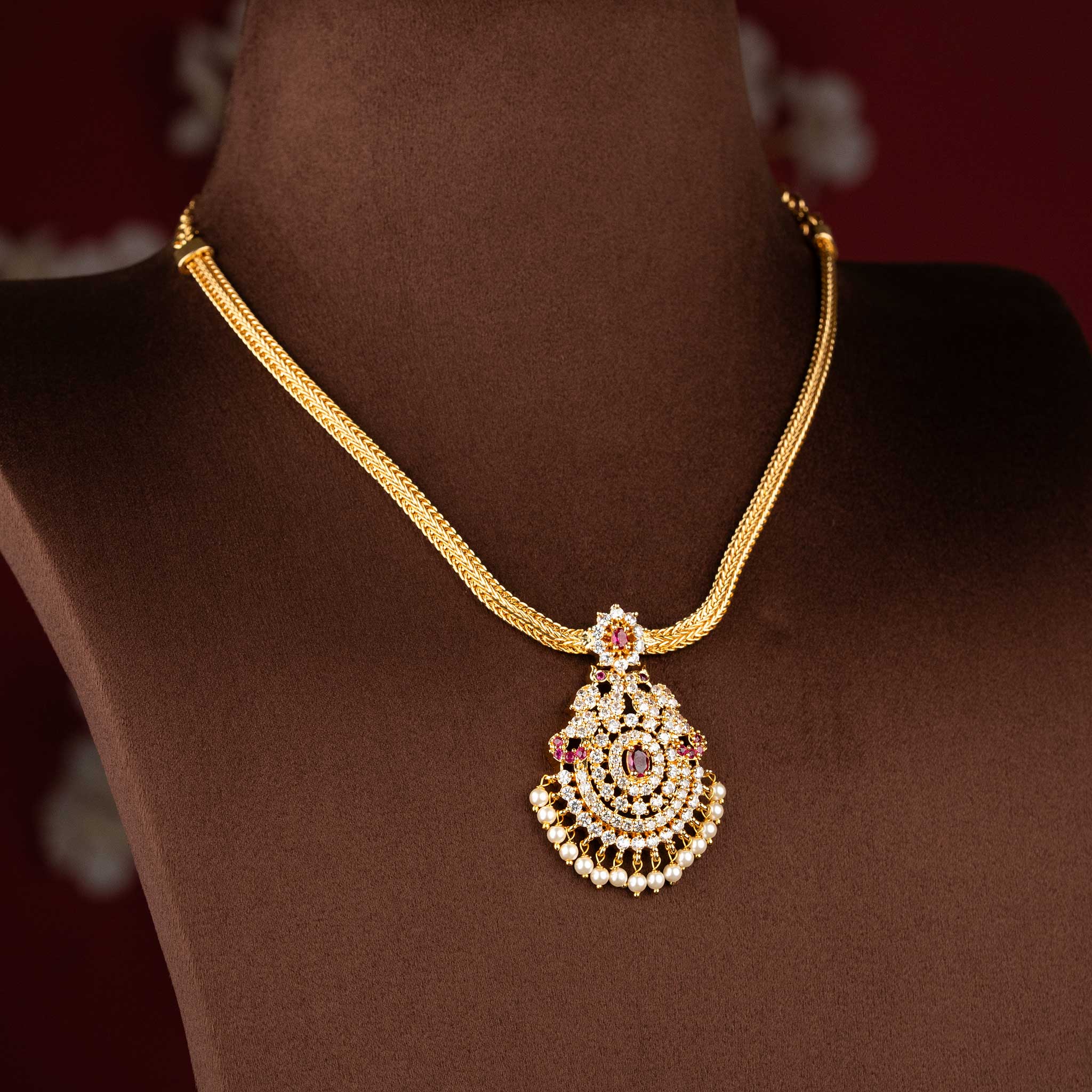 Elegant micro gold plated American Diamond pendant chain necklace by Sasitrends.