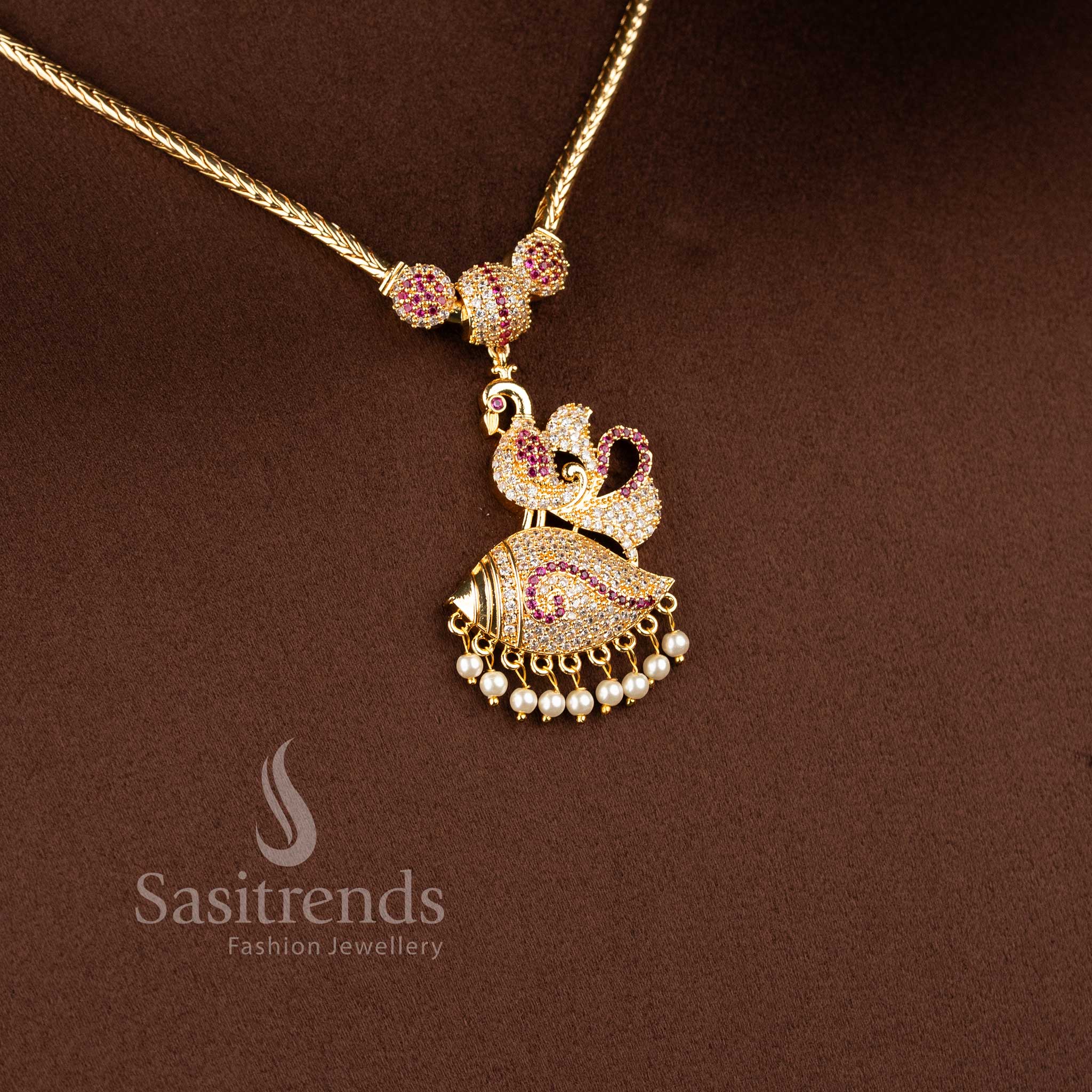 Sasitrends temple inspired pendant necklace with woven chain pattern and AD stone peacock centerpiece
