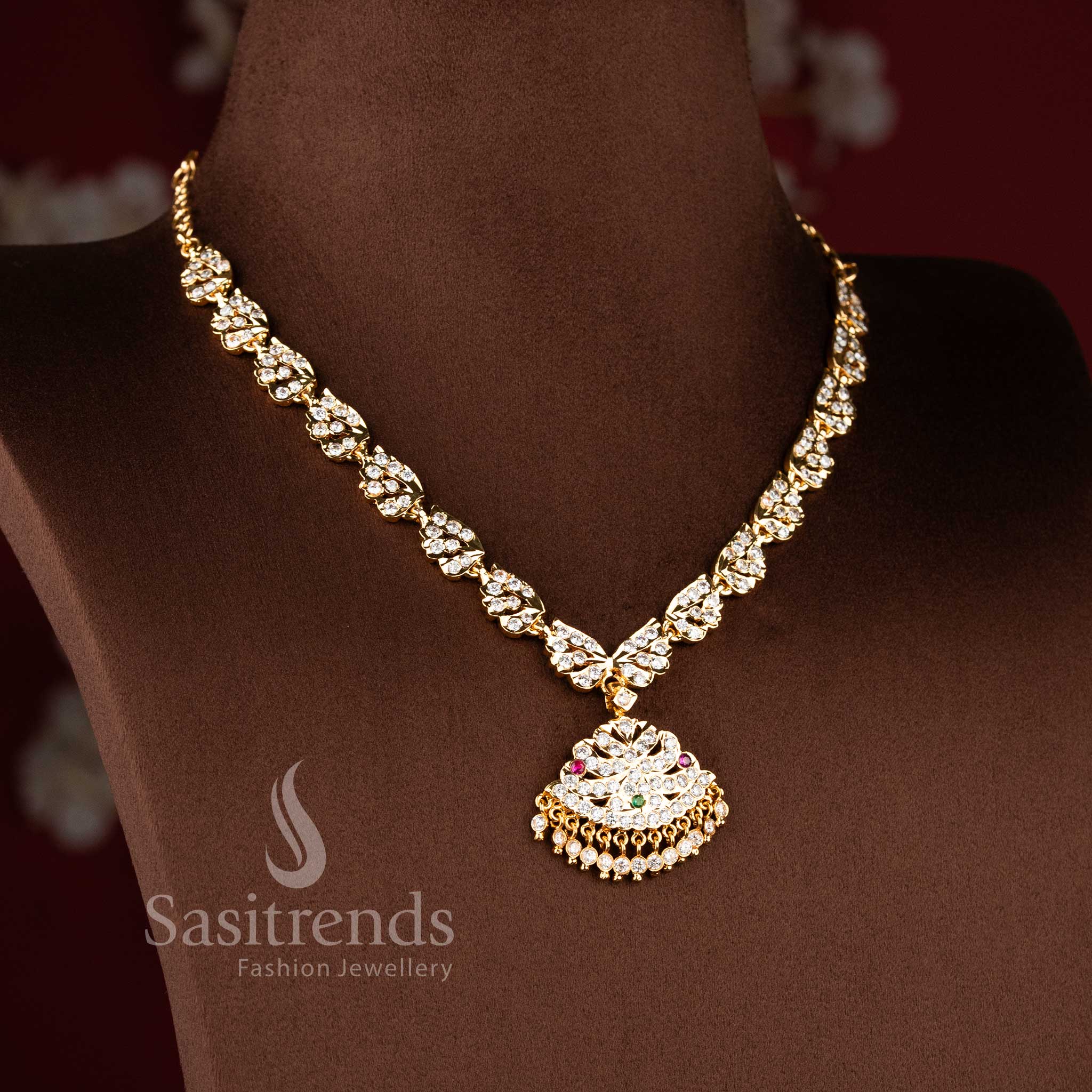 Designer traditional gati necklace showcasing intricate craftsmanship, sparkling AD stones, and elegant gold texture - Sasitrends.