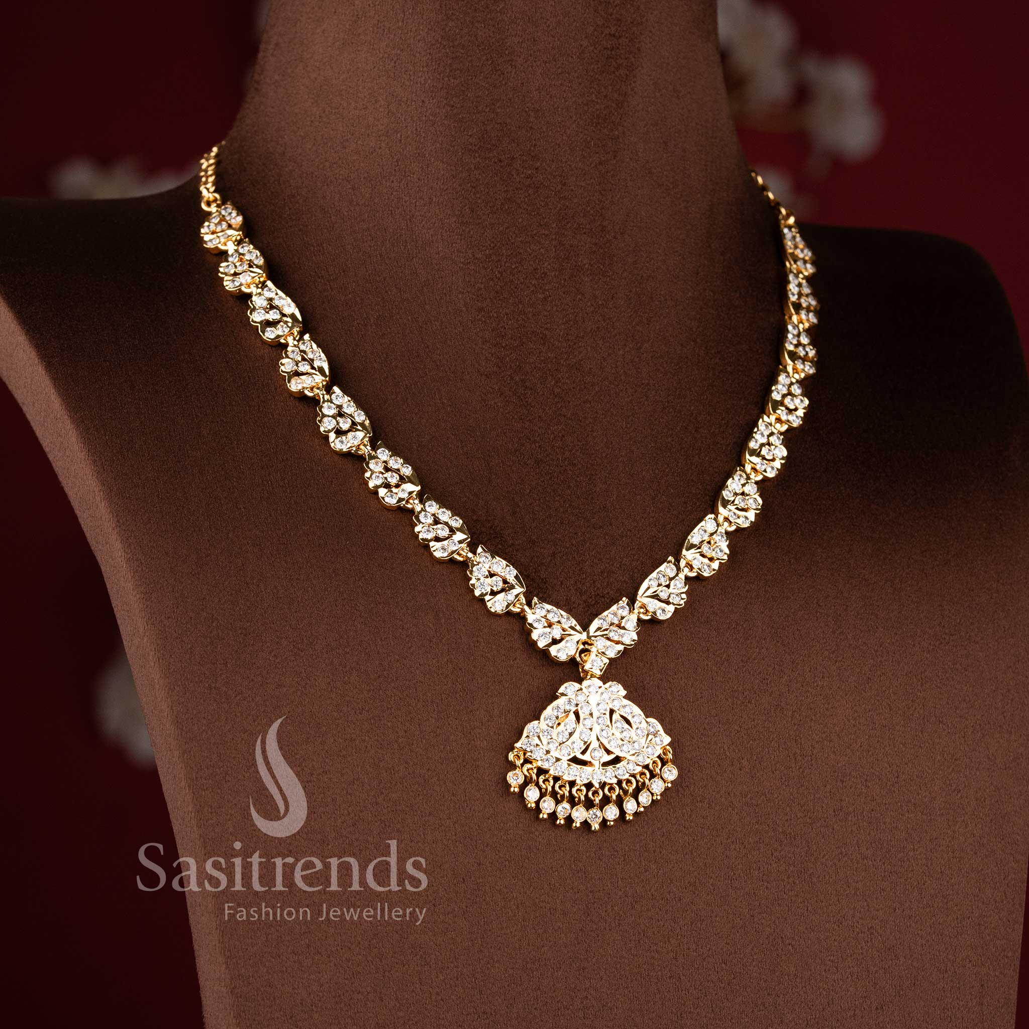 Festive wear micro gold plated traditional gati necklace for women with shimmering AD stone accents - Sasitrends.