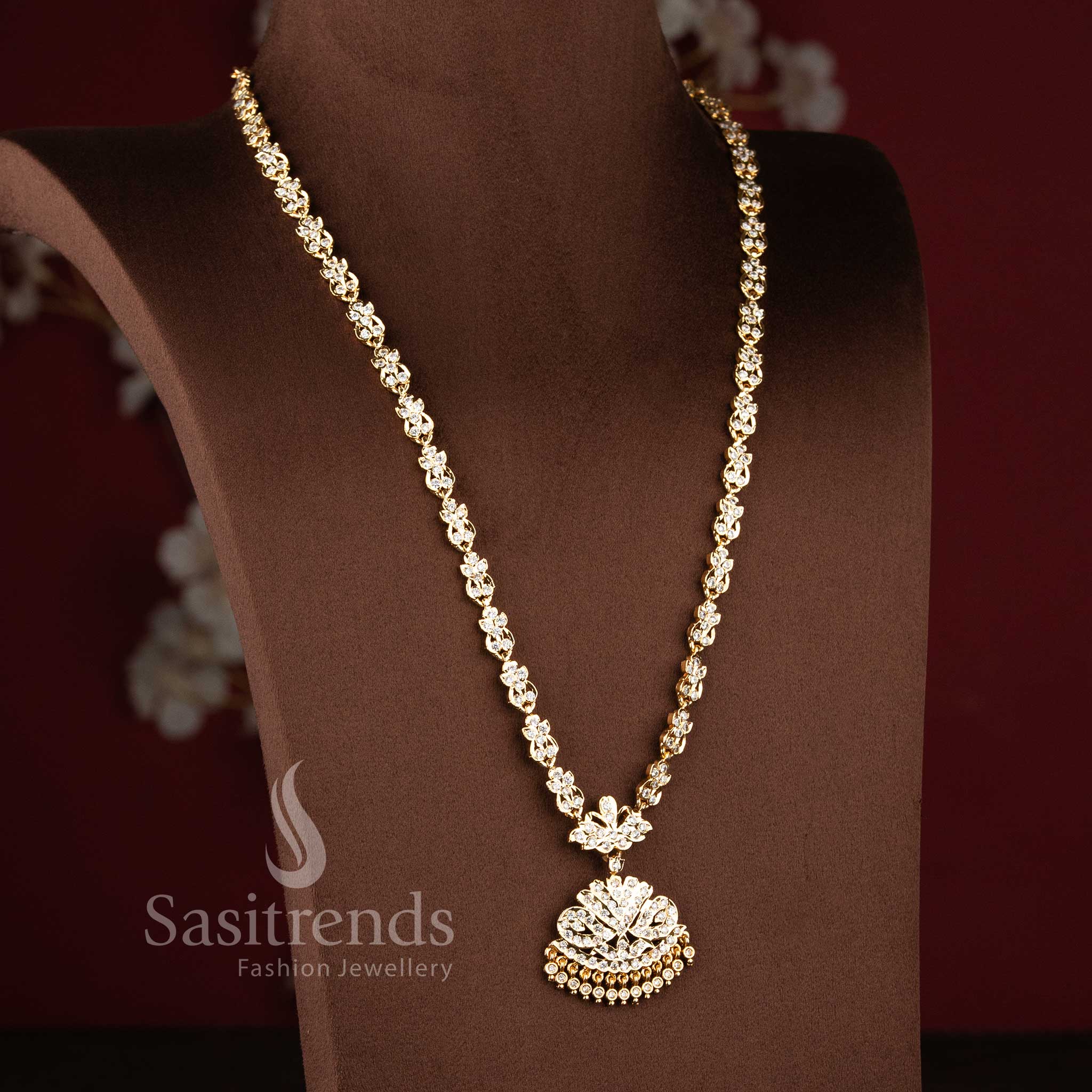Stylish micro gold plated wedding jewellery haram with brilliant white American Diamond clusters.