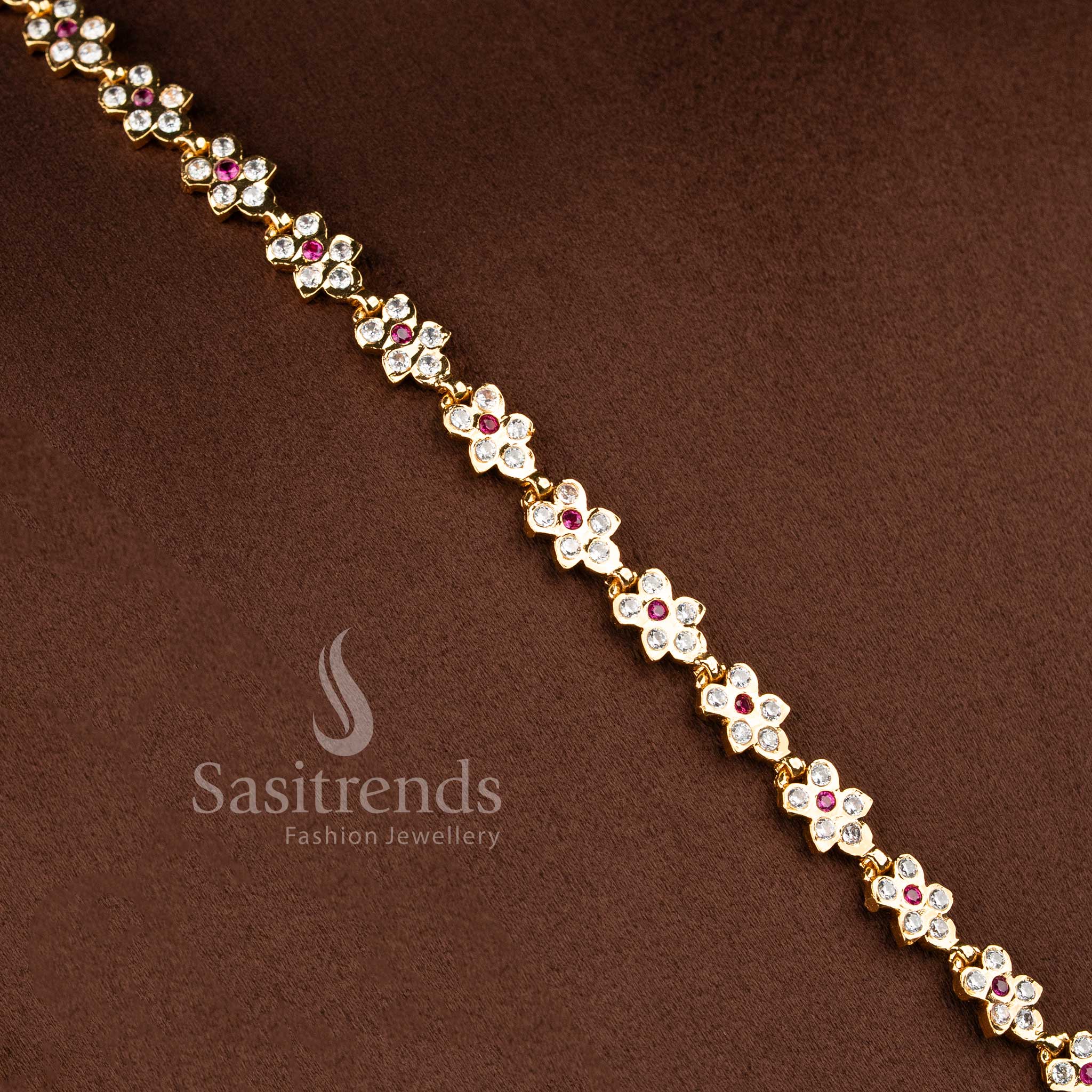 Elegant bridal-style AD stone long haram chain ensemble with a floral semicircular pendant.