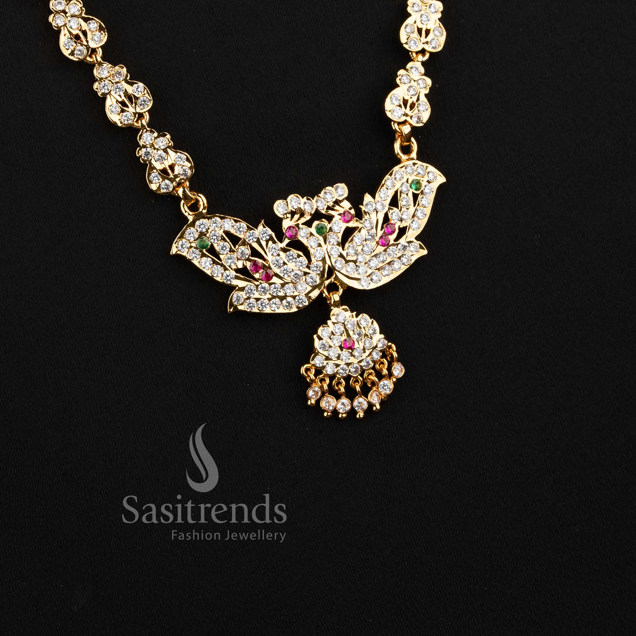 Elegant bridal-style AD stone long haram chain ensemble with a dual peacock pendant.