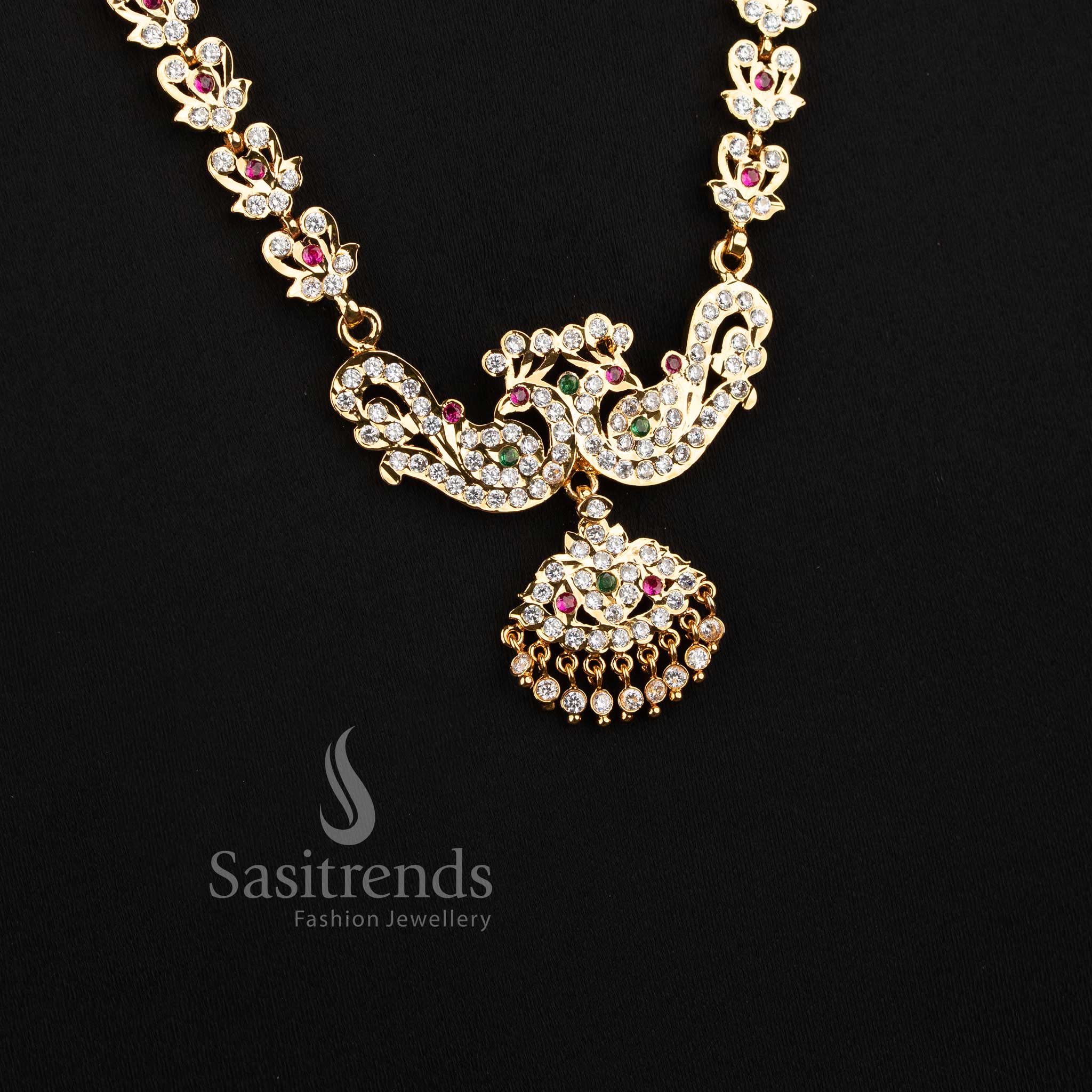 Stylish micro gold plated wedding jewellery haram with brilliant white American Diamond clusters.