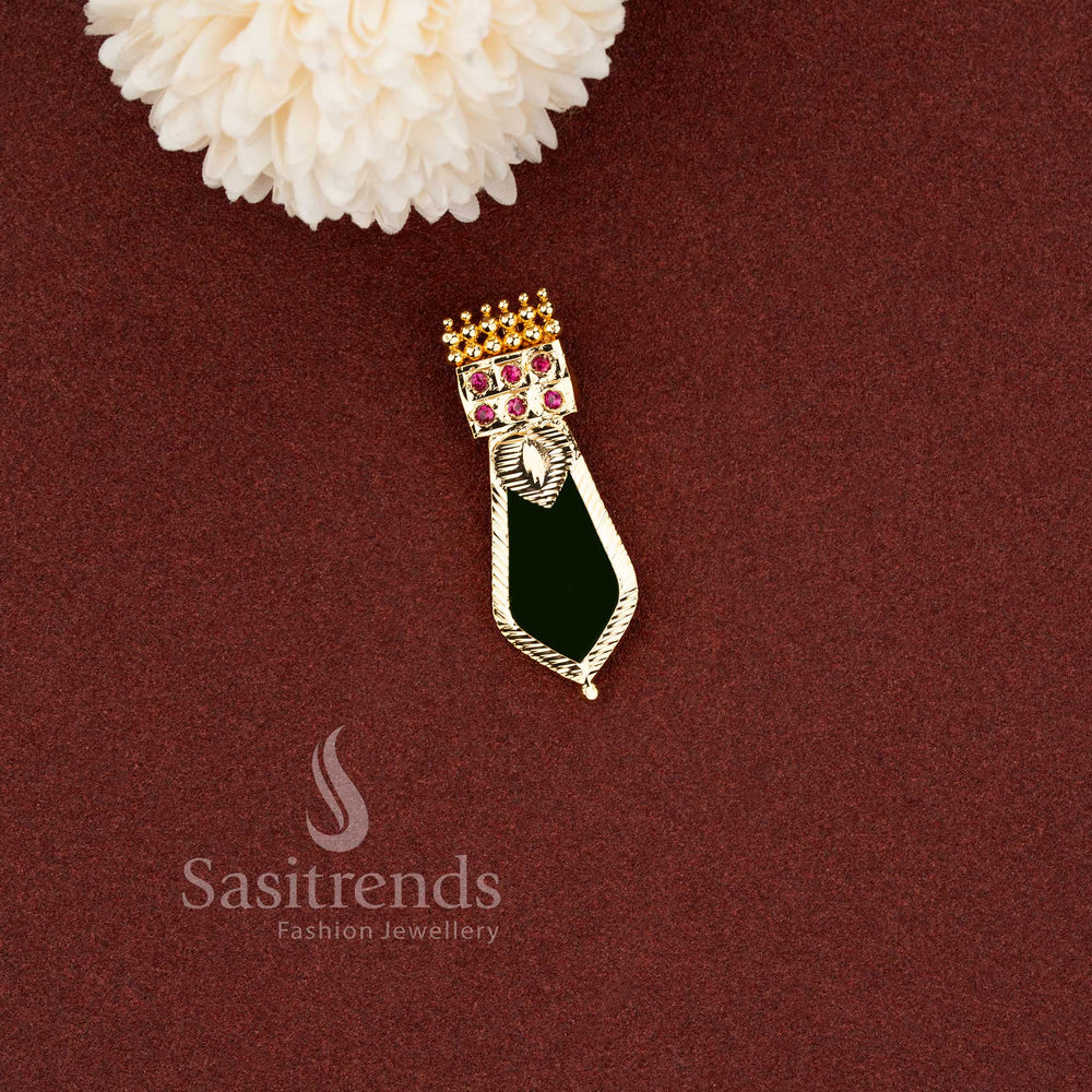 Traditional green enamel Nagapadam pendant designed with ruby stone accents and textured gold finish - Sasitrends
